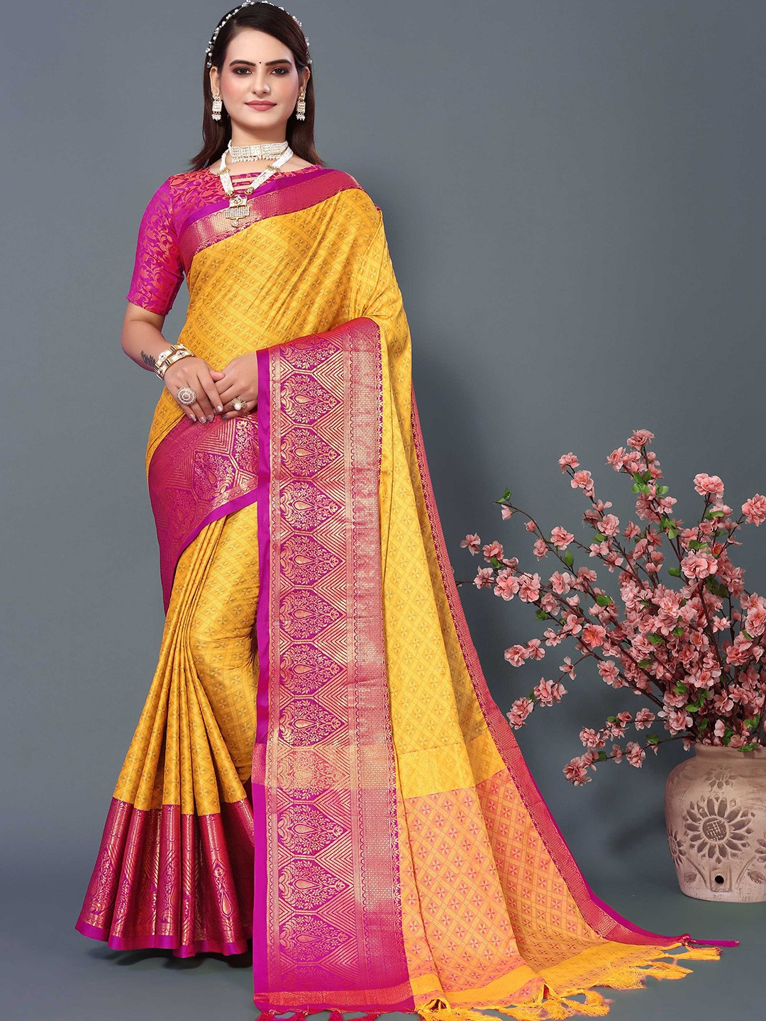 

Mitera Yellow & Magenta Ethnic Woven Design Zari Silk Cotton Banarasi Saree