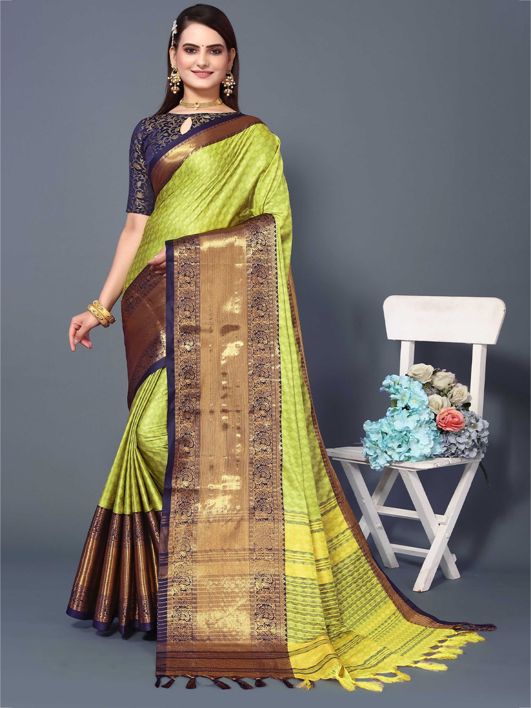 

Mitera Green & Brown Ethnic Motifs Woven Design Zari Silk Cotton Banarasi Saree