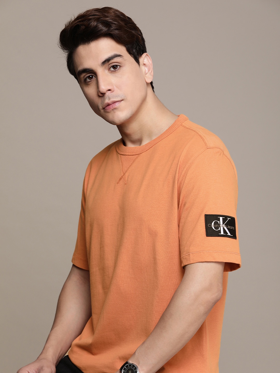 

Calvin Klein Jeans Pure Cotton Solid Round Neck Casual T-shirt, Orange