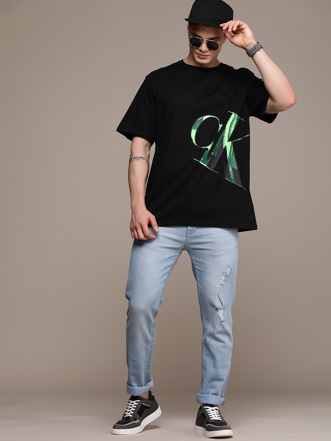 

Calvin Klein Jeans Pure Cotton Brand Logo Printed Drop-Shoulder Sleeves Boxy T-shirt, Black