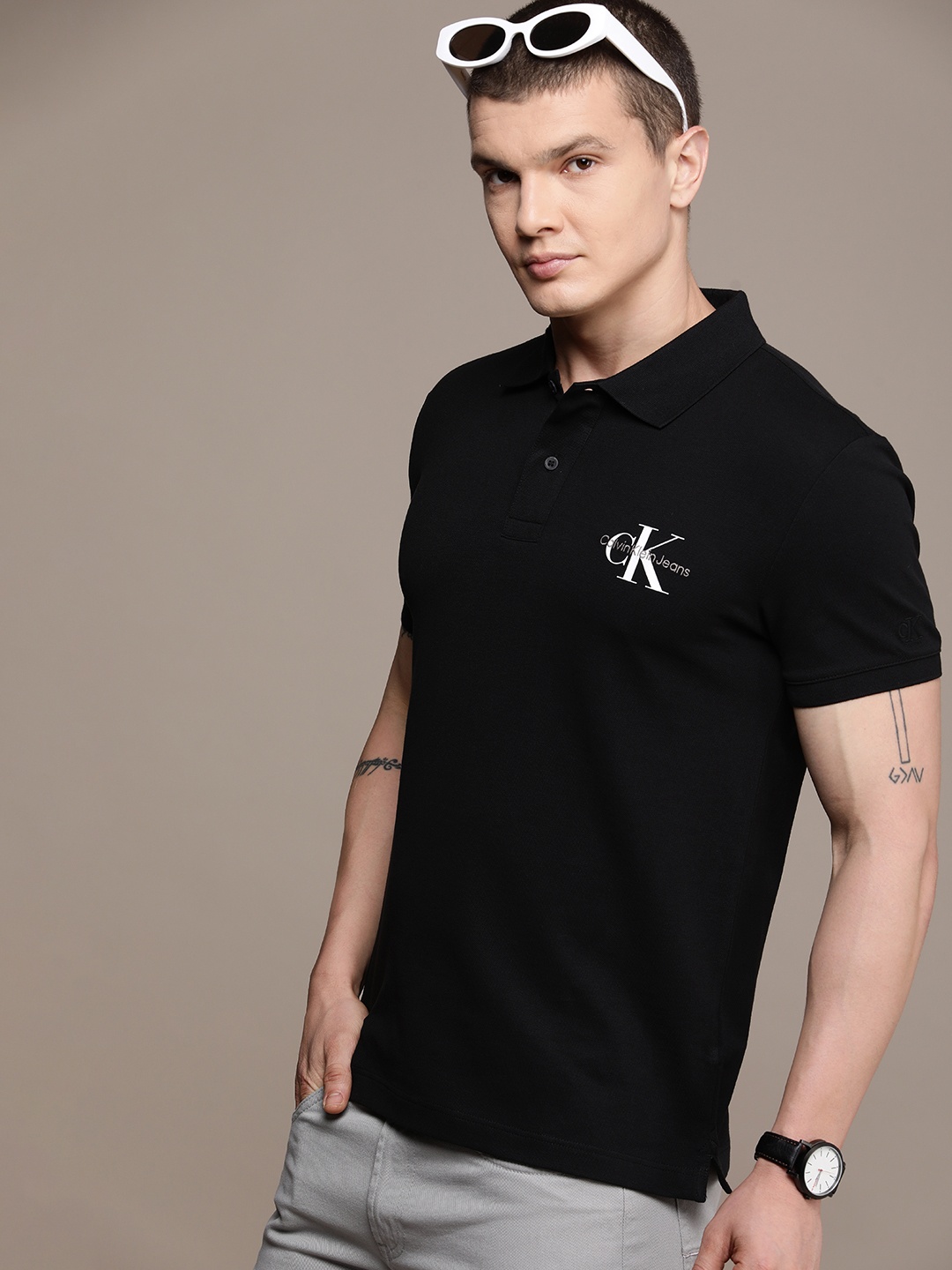 

Calvin Klein Jeans Polo Collar Solid Casual T-shirt, Black