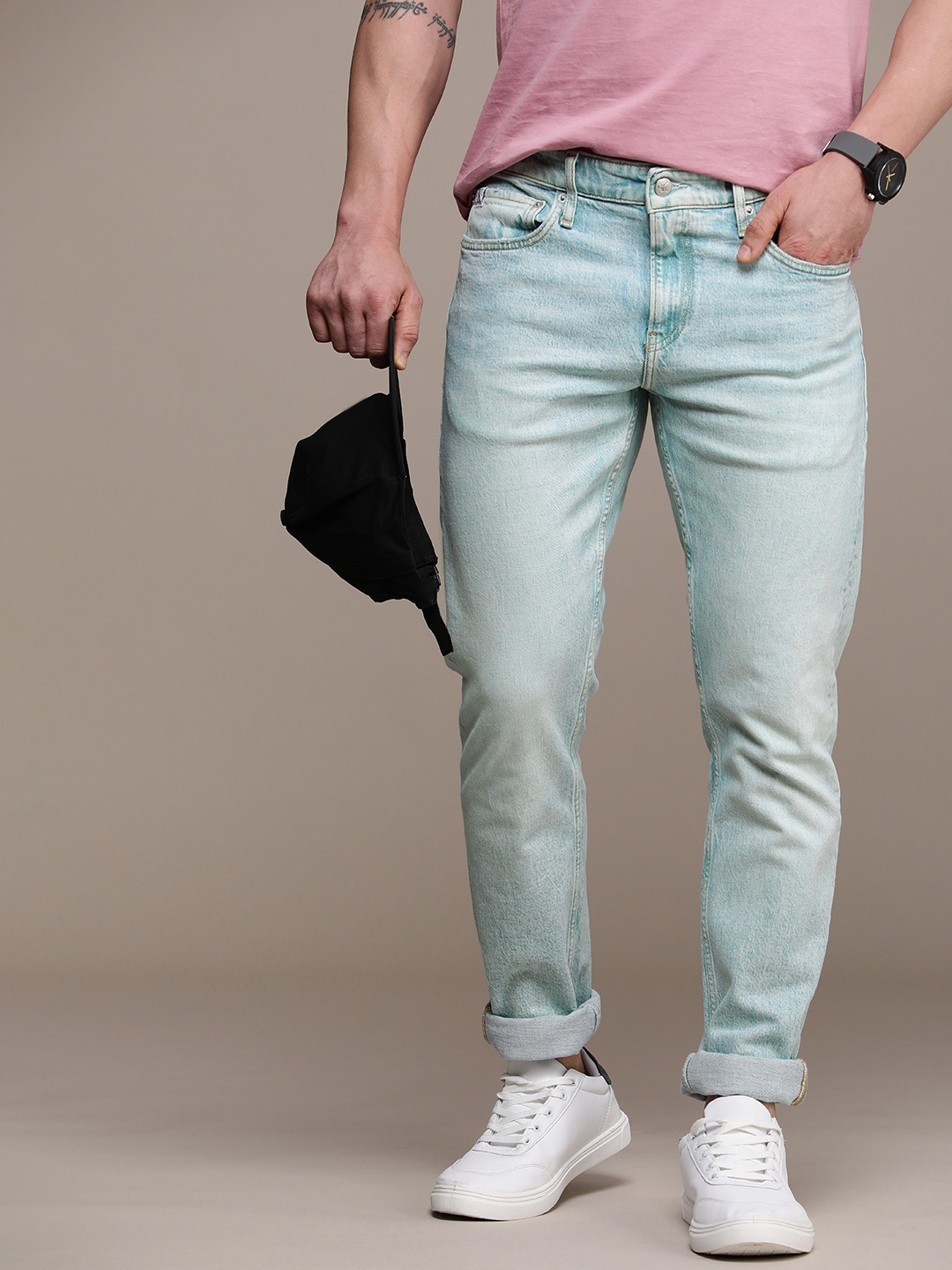 

Calvin Klein Jeans Men Slim Fit Light Fade Stretchable Jeans, Blue