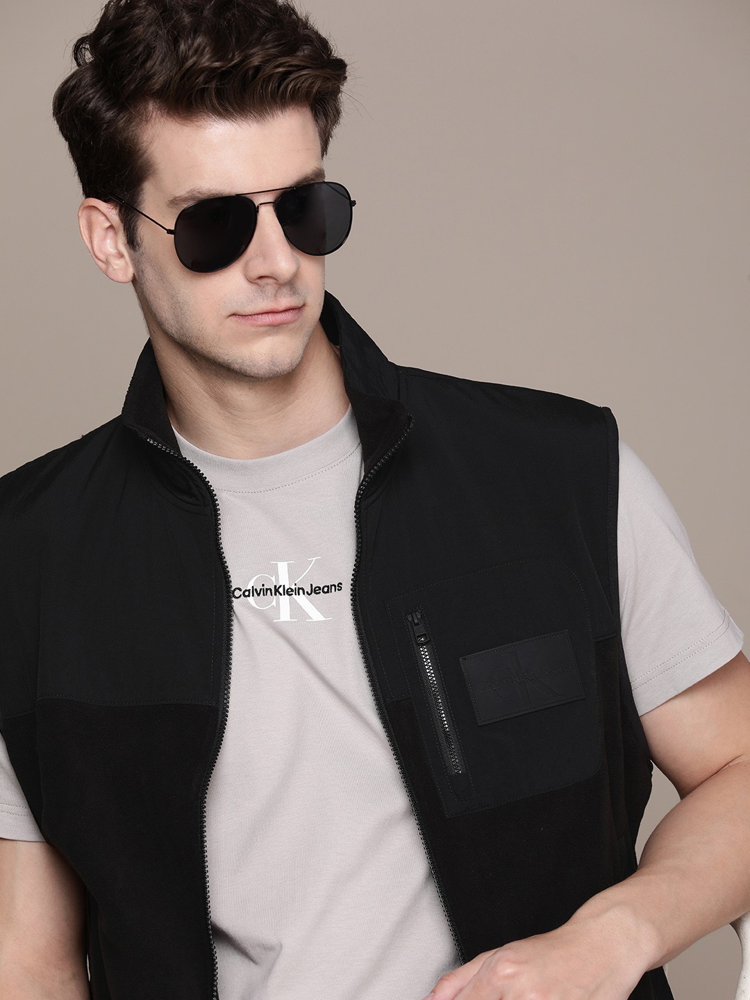 

Calvin Klein Jeans Pure Cotton Mock Collar Sleeveless Solid Sweatshirt, Black
