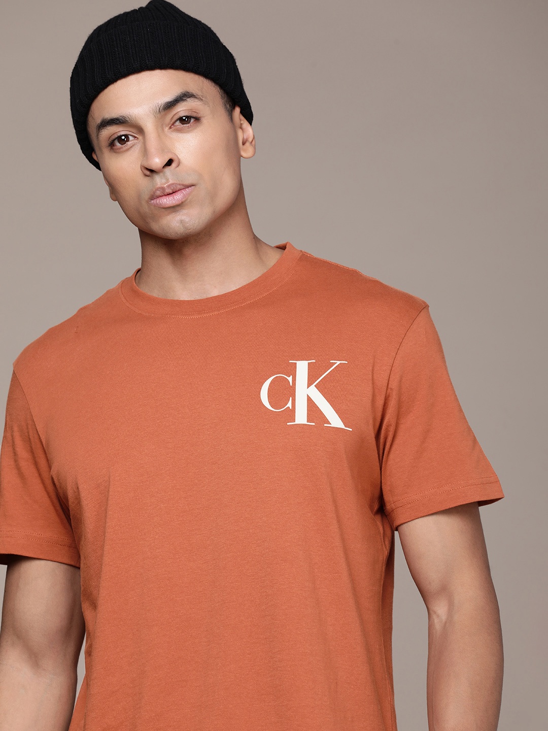 

Calvin Klein Jeans Brand Logo Printed Pure Cotton T-shirt, Rust