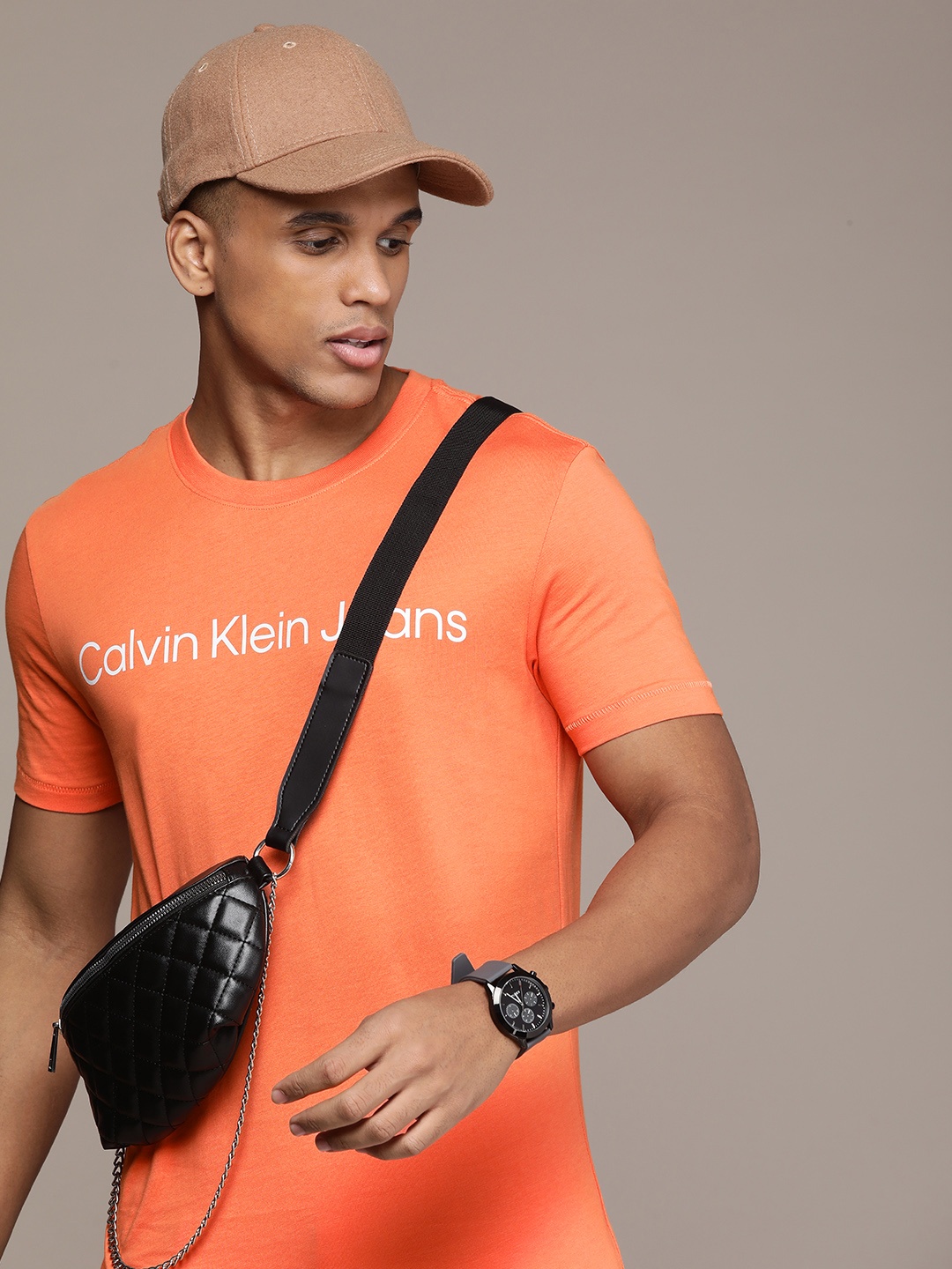 

Calvin Klein Jeans Brand Logo Printed Slim Fit Pure Cotton T-shirt, Orange