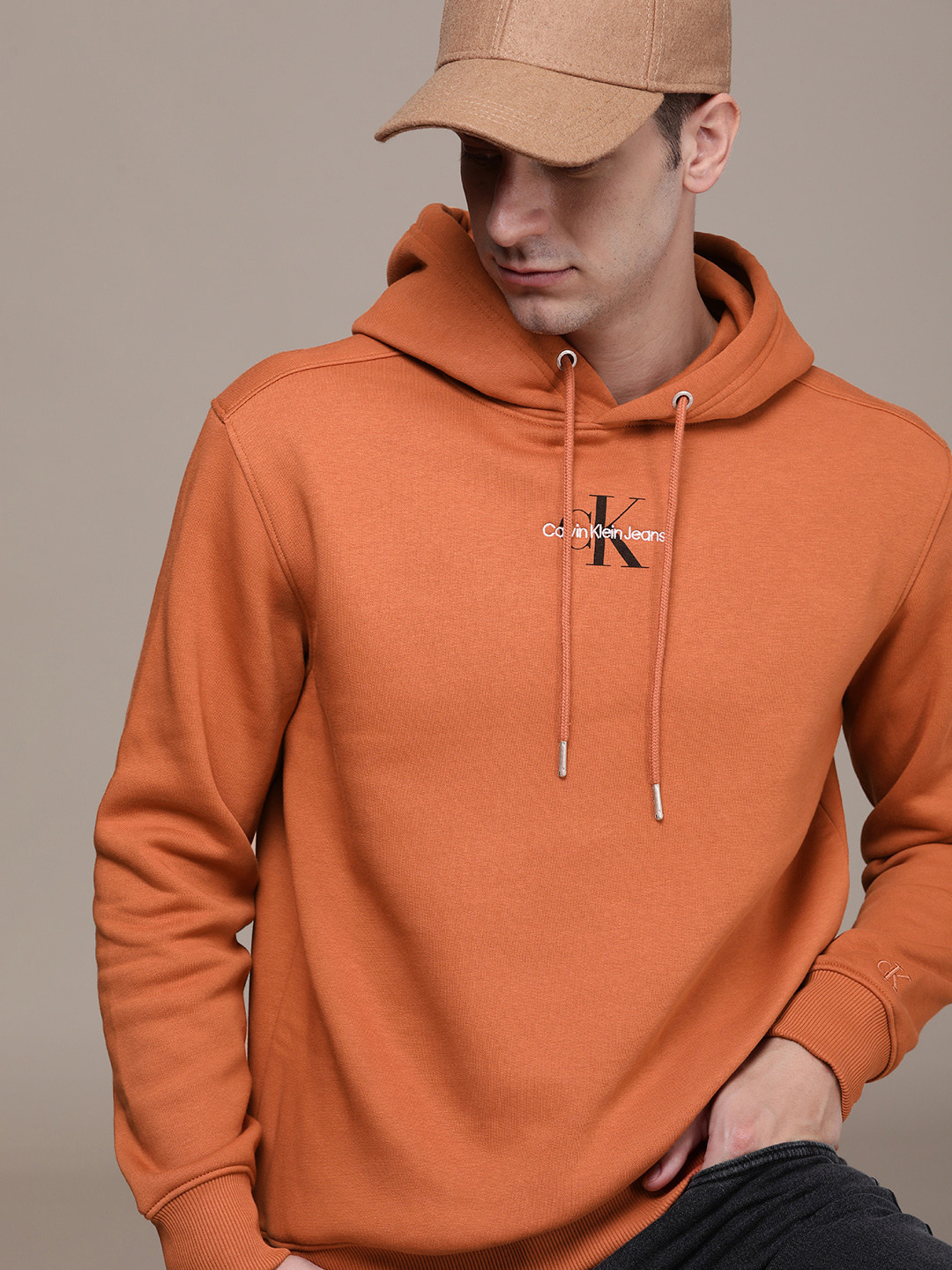 

Calvin Klein Jeans Minimal Brand Logo Embroidered Detail Hooded Sweatshirt, Orange