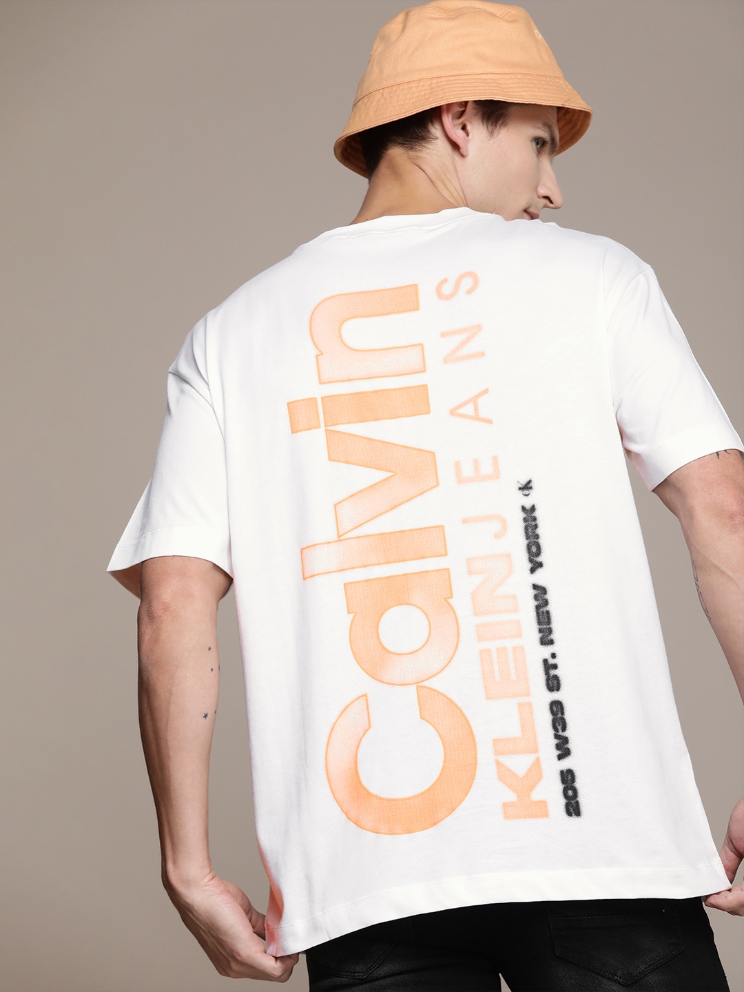 

Calvin Klein Jeans Brand Logo Printed Drop-Shoulder Sleeves Pure Cotton Boxy T-shirt, White