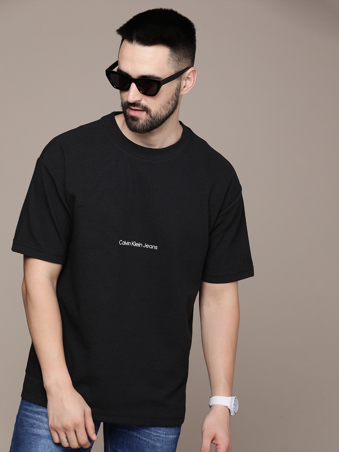 

Calvin Klein Jeans Drop-Shoulder Sleeves Round Neck Solid Casaul T-shirt, Black