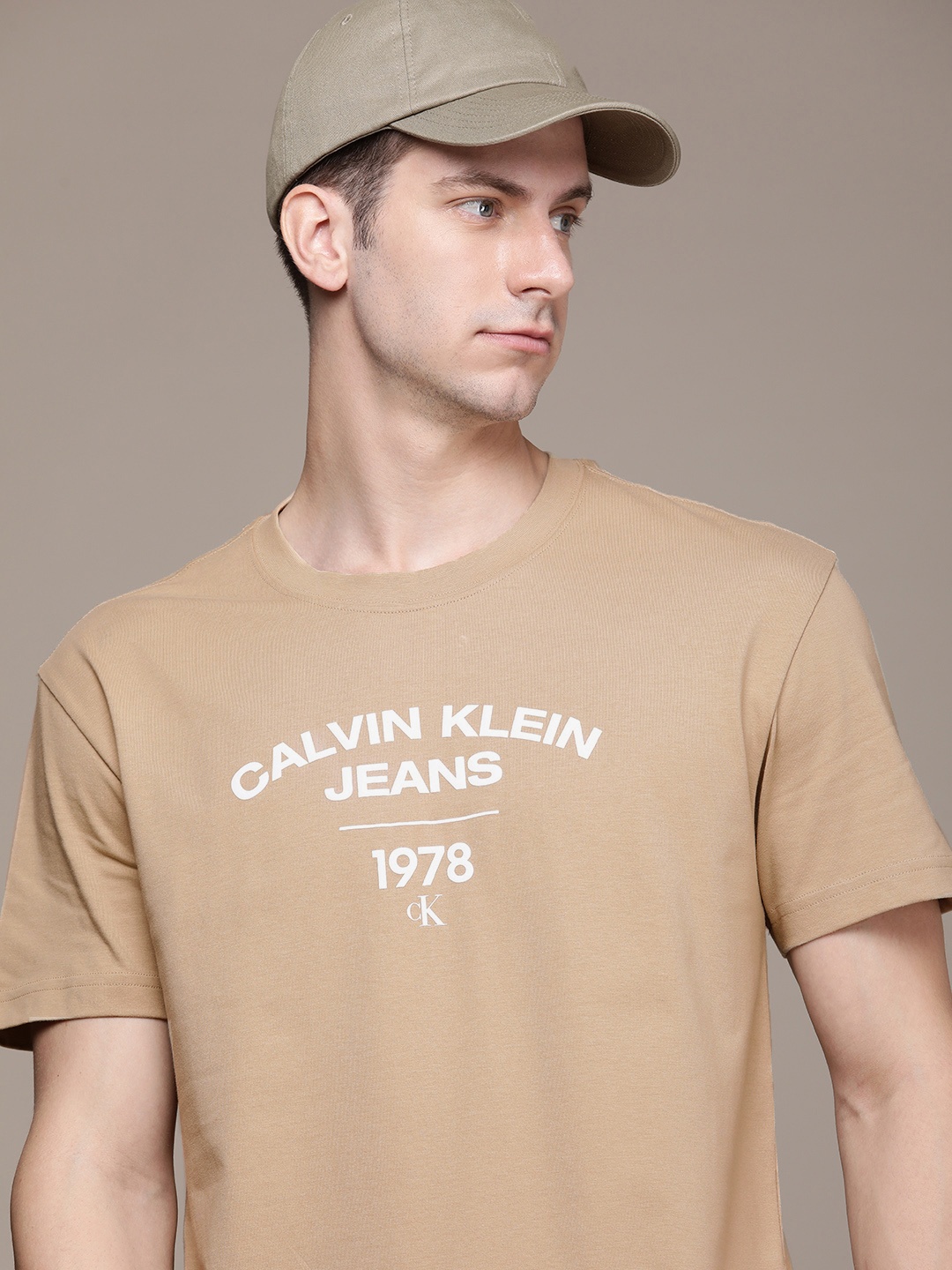 

Calvin Klein Jeans Pure Cotton Brand Logo Printed T-shirt, Beige