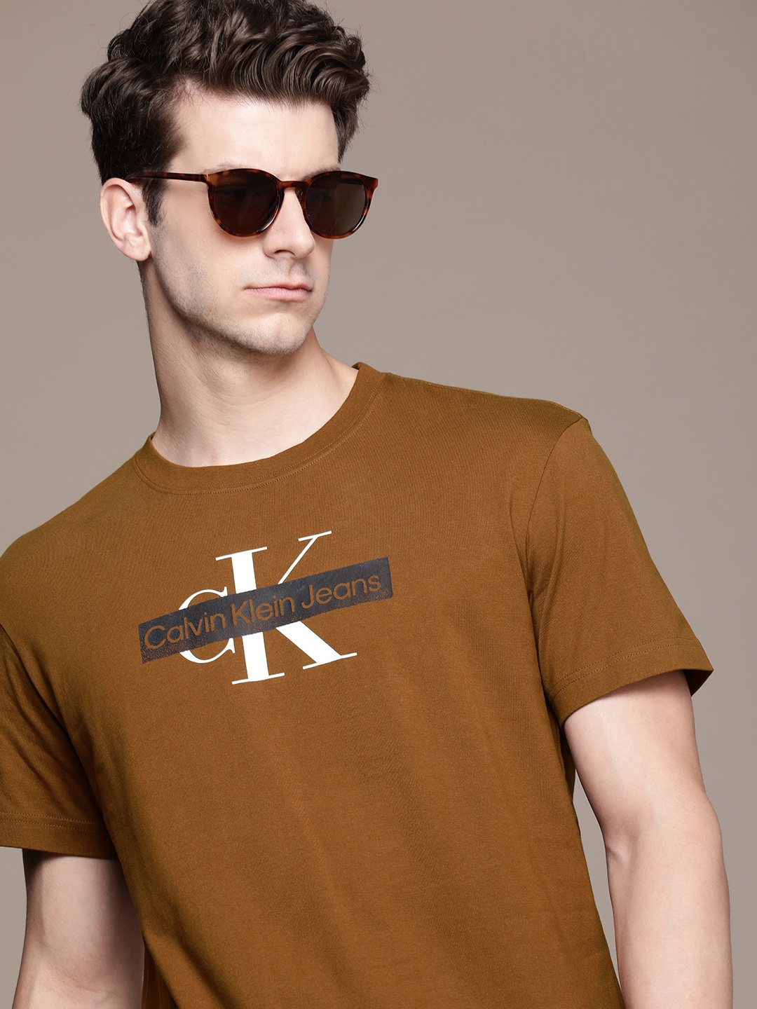 

Calvin Klein Jeans Brand Logo Printed Pure Cotton T-shirt, Brown