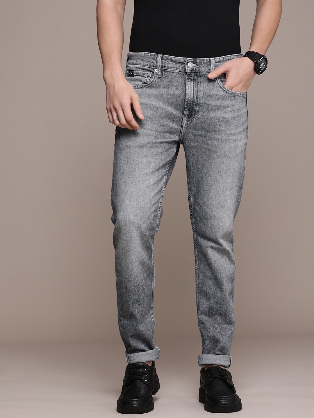 

Calvin Klein Jeans Men Slim Taper Fit Light Fade Stretchable Jeans, Grey