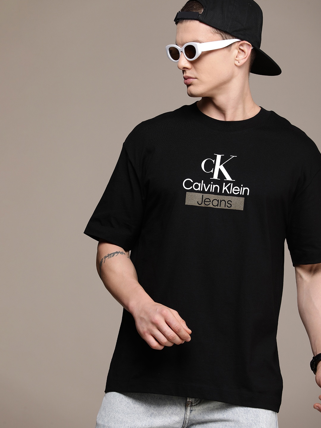 

Calvin Klein Jeans Pure Cotton Brand Logo Printed Drop-Shoulder Sleeves Boxy T-shirt, Black