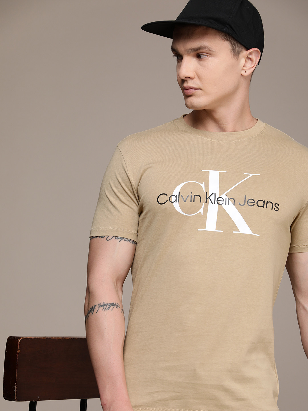

Calvin Klein Jeans Brand Logo Printed Pure Cotton Slim Fit T-shirt, Beige