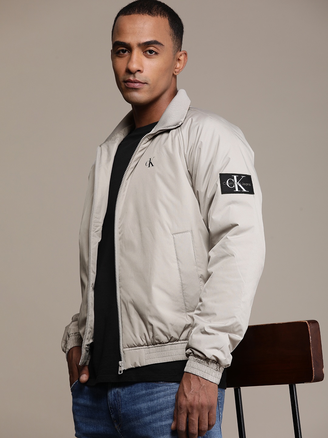 

Calvin Klein Jeans Solid Padded Jacket with Patchwork Detail, Grey