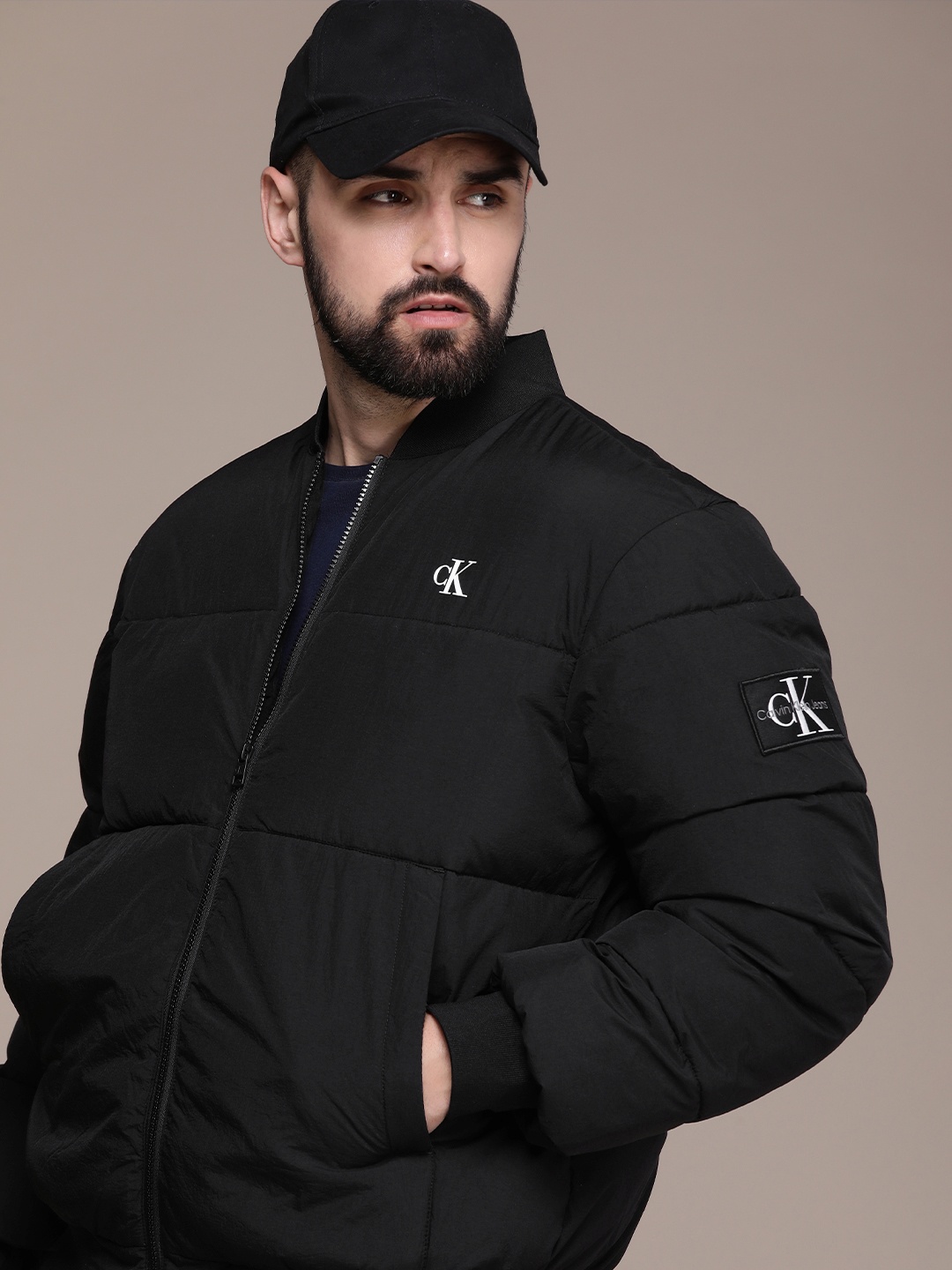 

Calvin Klein Jeans Water Repellent Solid Mock Collar Puffer Jacket, Black