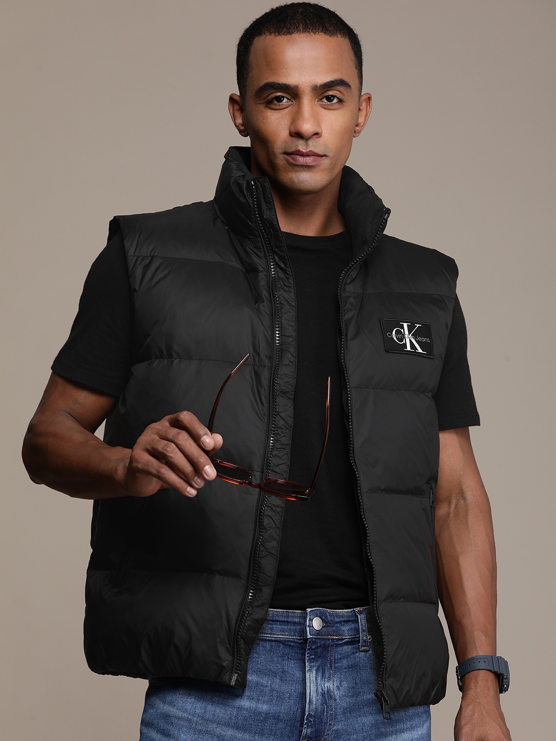 

Calvin Klein Jeans Men Solid Mock Collar Gilet Puffer Jacket, Black