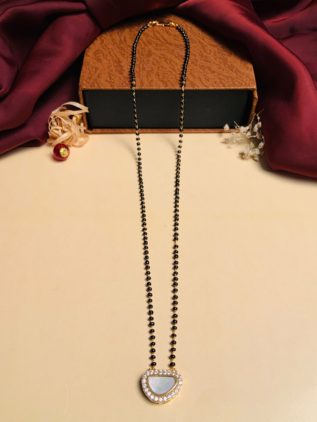 

ABDESIGNS Gold-Plated Black Beaded Mother Pearl & American Diamond Mangalsutra