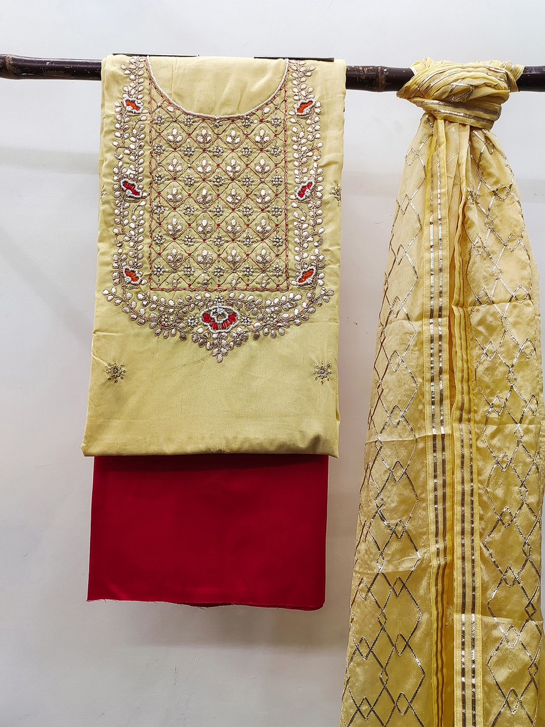 

KALINI Yellow & Red Embroidered Unstitched Dress Material
