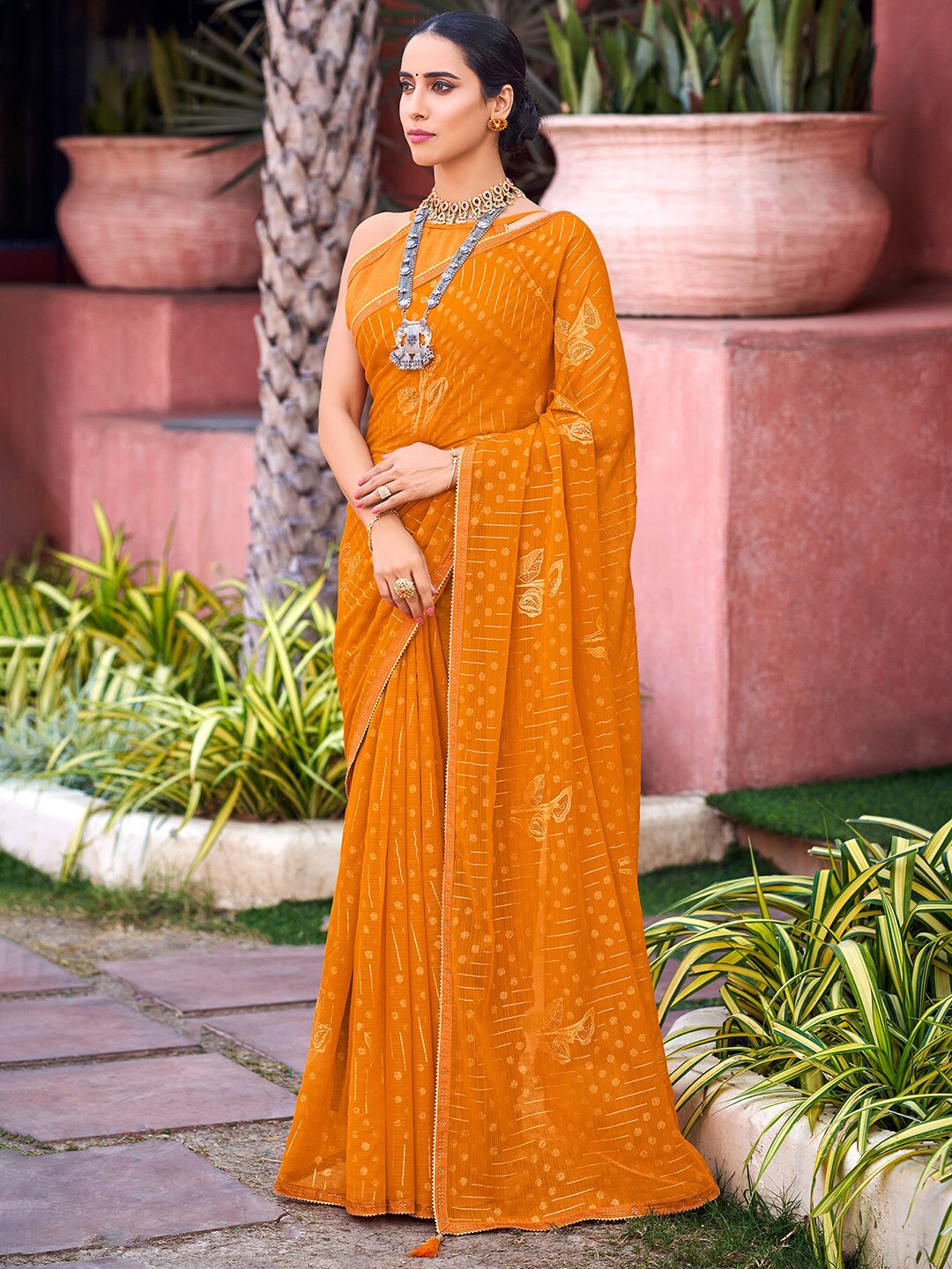 

Saree mall Floral Printed Embellished Pure Georgette Saree, Mustard
