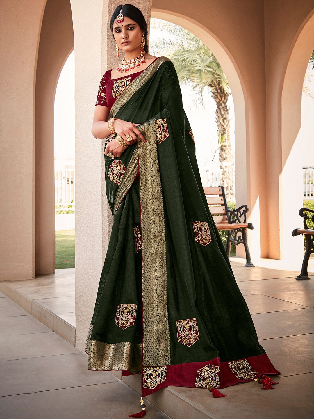 

Saree mall Ethnic Motifs Embroidered Zari Saree, Green