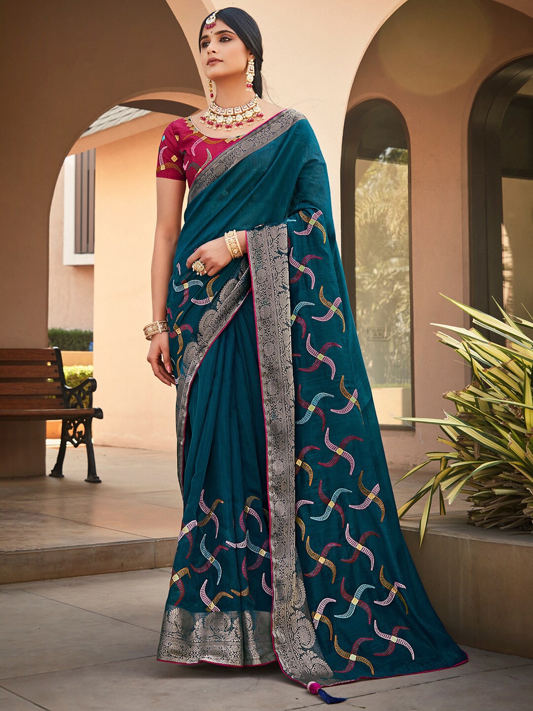 

Saree mall Ethnic Motifs Embroidered Zari Saree, Teal