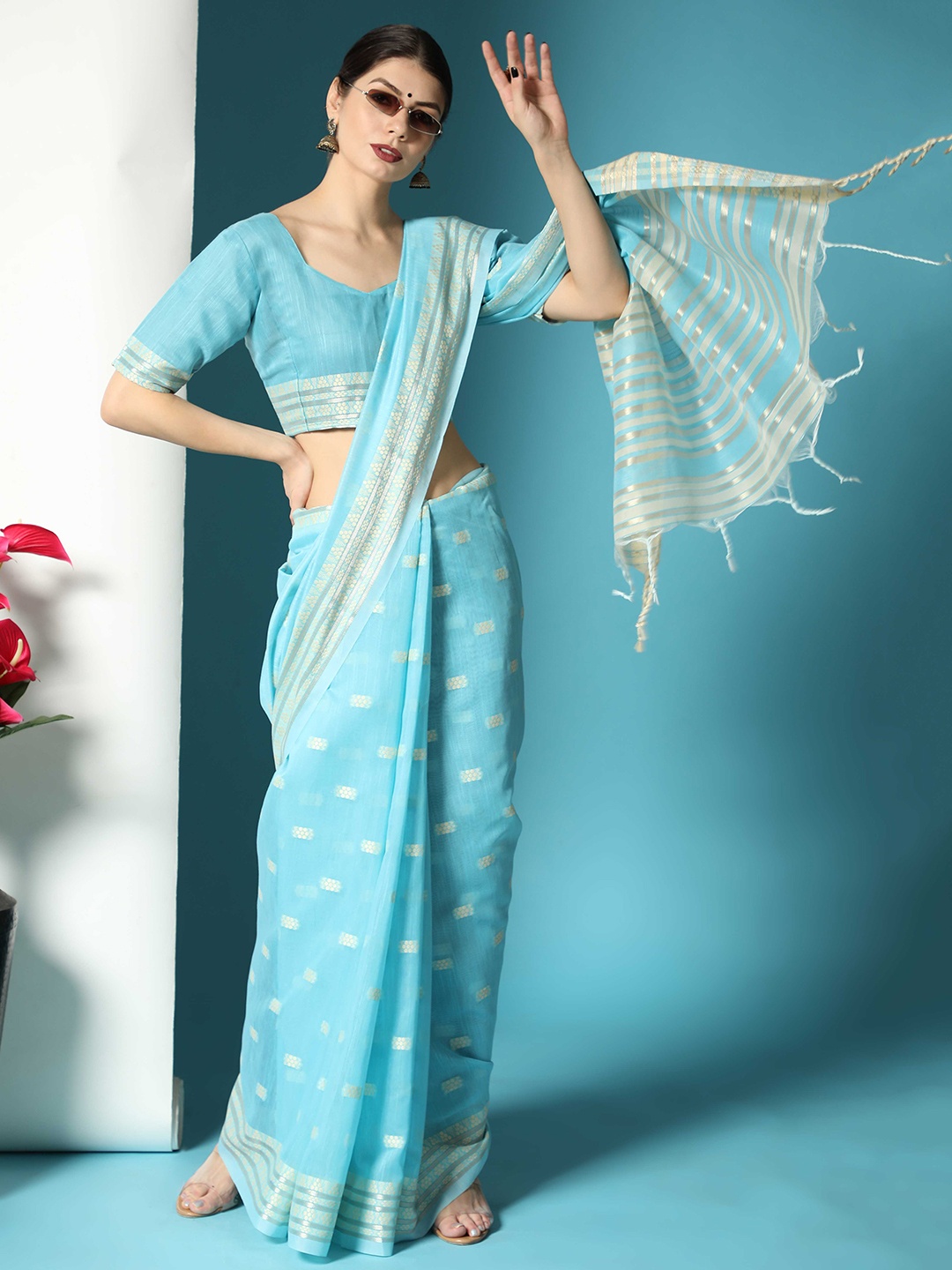 

Mitera Blue & Gold-Toned Ethnic Motif Woven Design Zari Saree