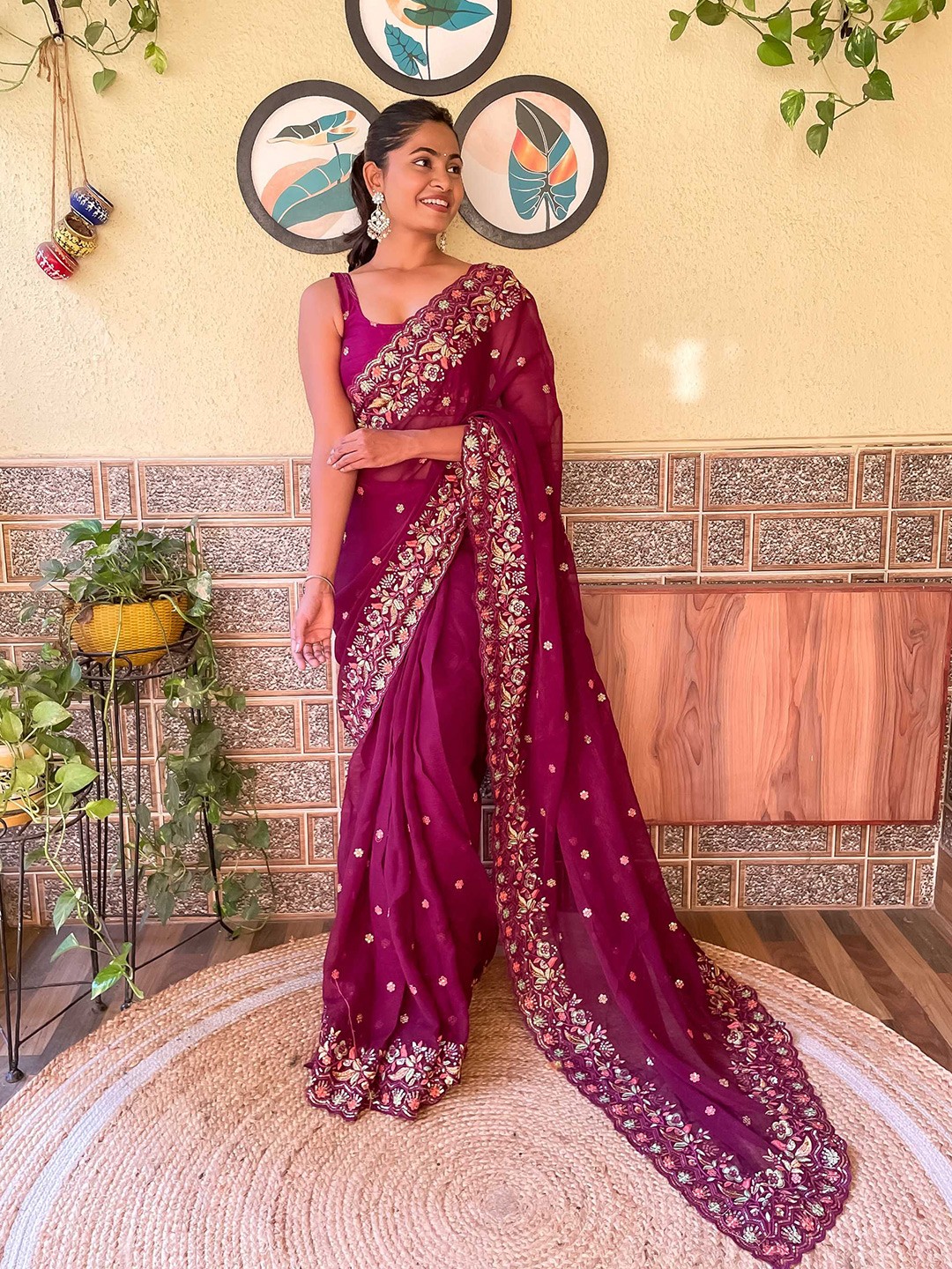 

Mitera Purple & Pink Floral Embroidered Saree