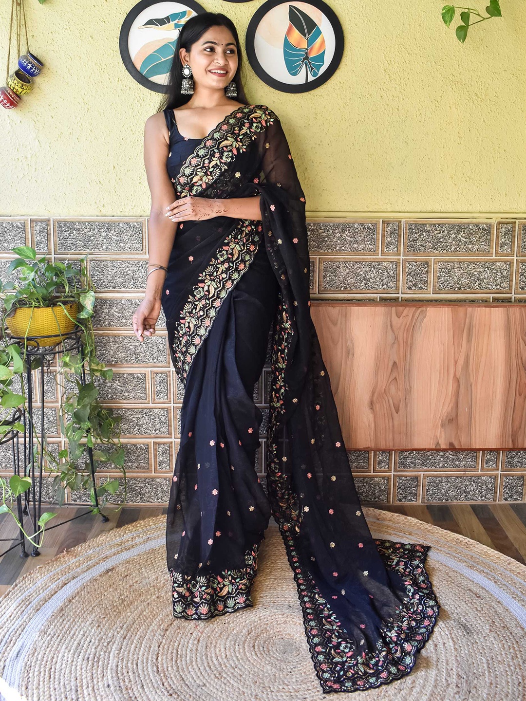 

Mitera Black & Peach-Coloured Floral Embroidered Saree