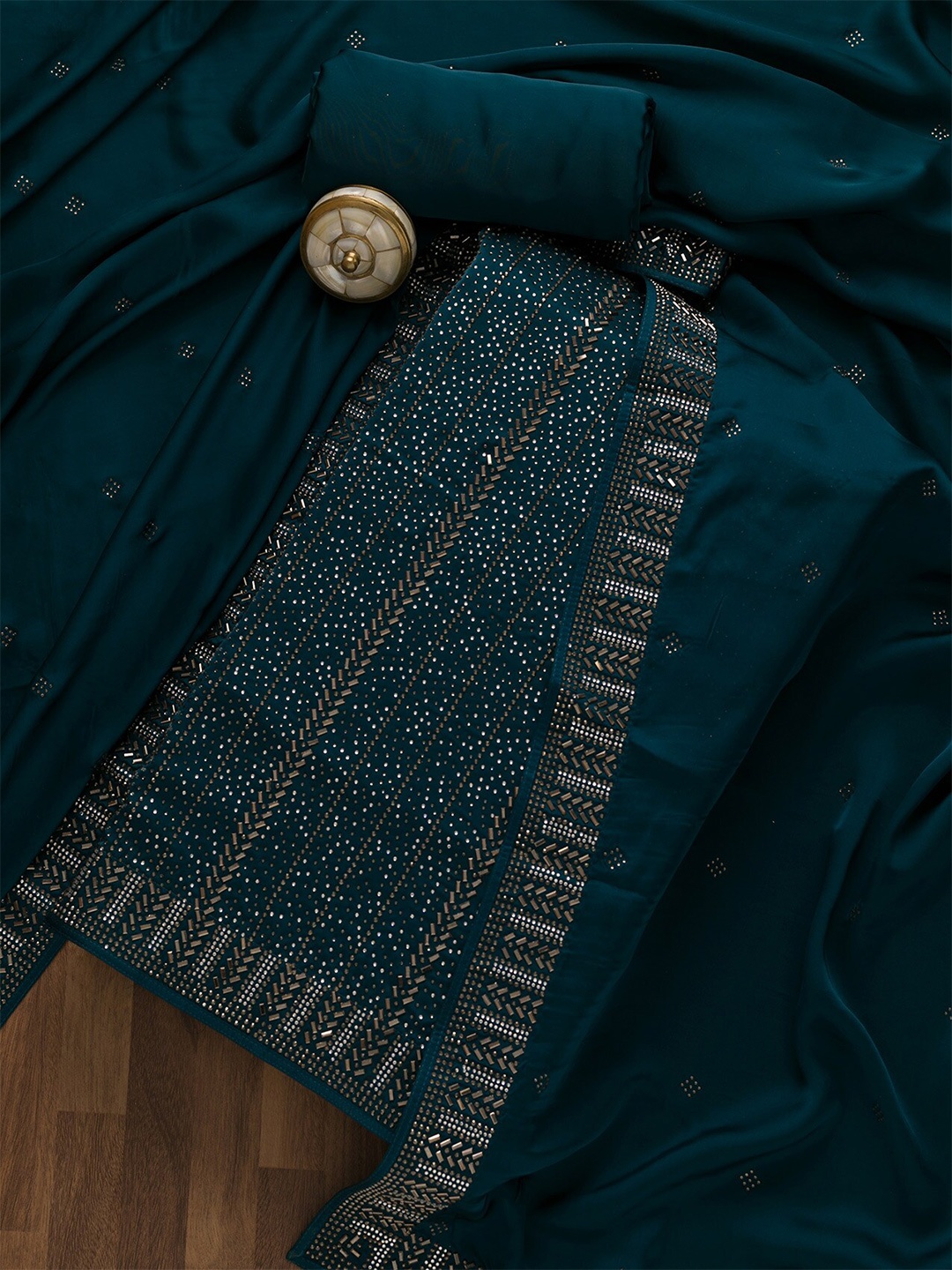 

Koskii Embellished Satin Semi-Stitched Dress Material, Blue