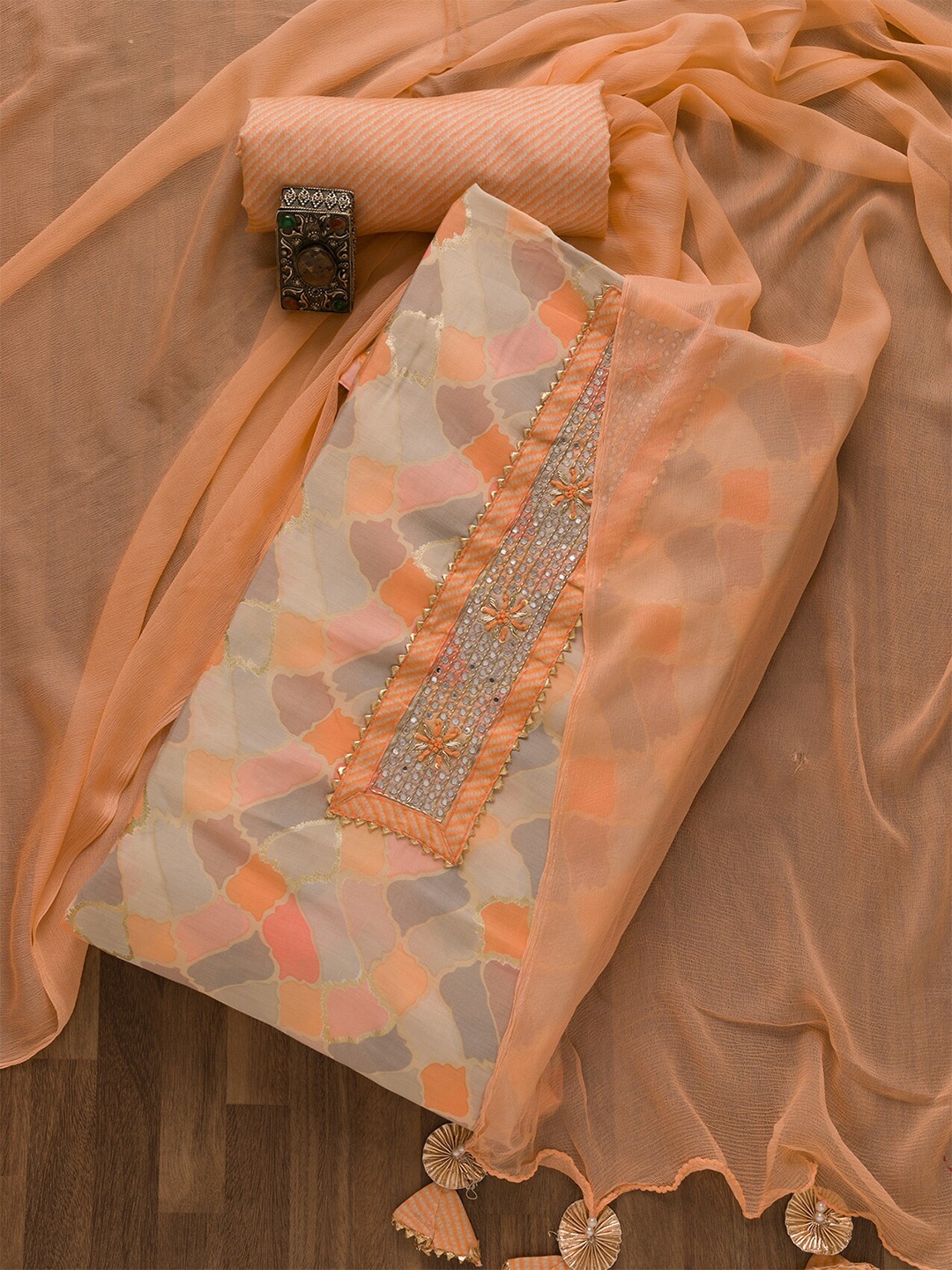 

Koskii Abstract Printed Gotta Patti Semi-Stitched Dress Material, Peach