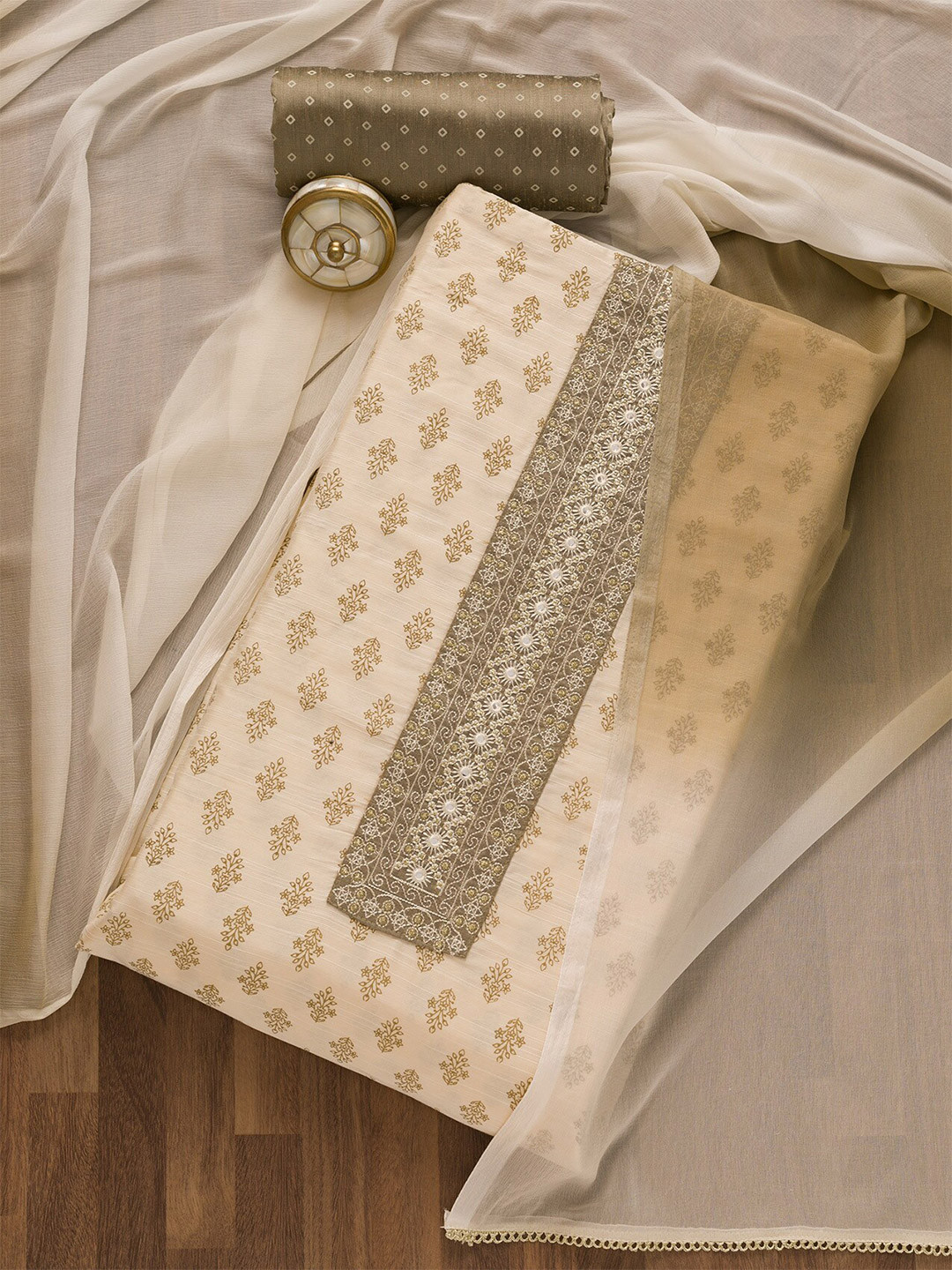 

Koskii Ethnic Motifs Printed Mirror Work Semi-Stitched Dress Material, Cream