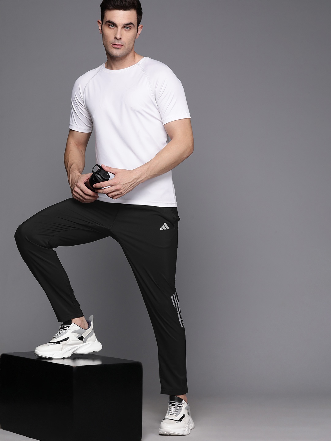 

ADIDAS Men Own The Run Woven Astro Track Pants, Black