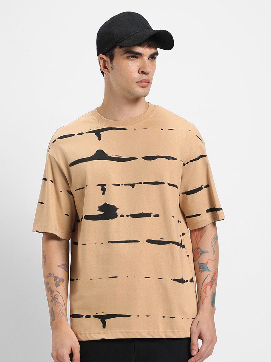 

Bewakoof Brown Abstract Printed Pure Cotton Oversized T-Shirt