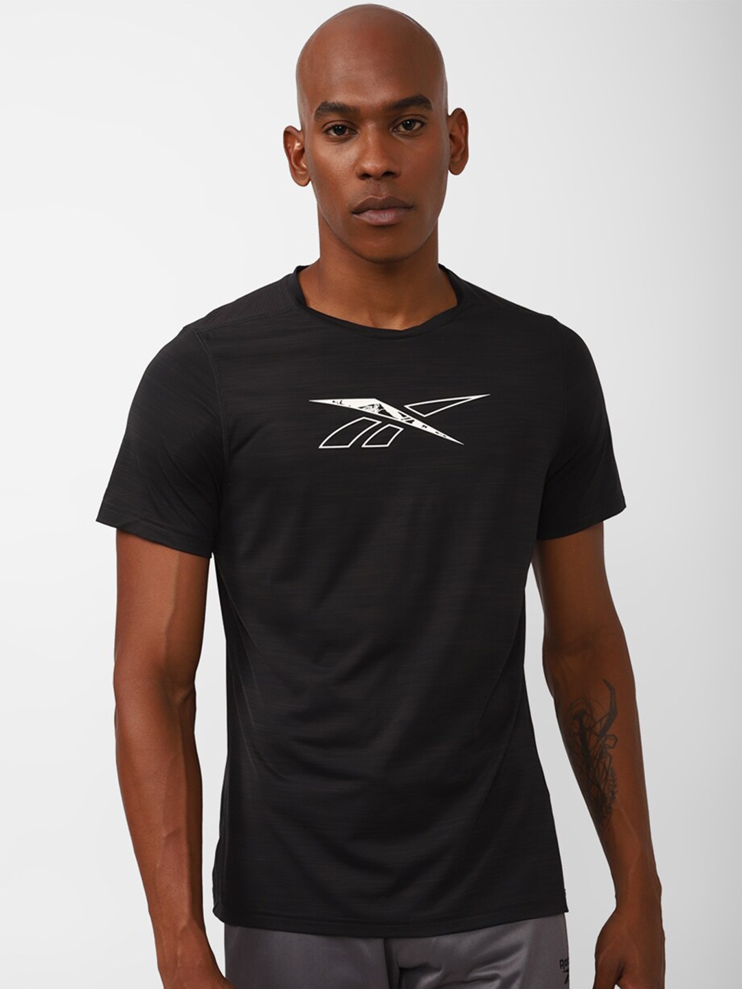 

Reebok Men WOR AC SS T-Shirt, Black