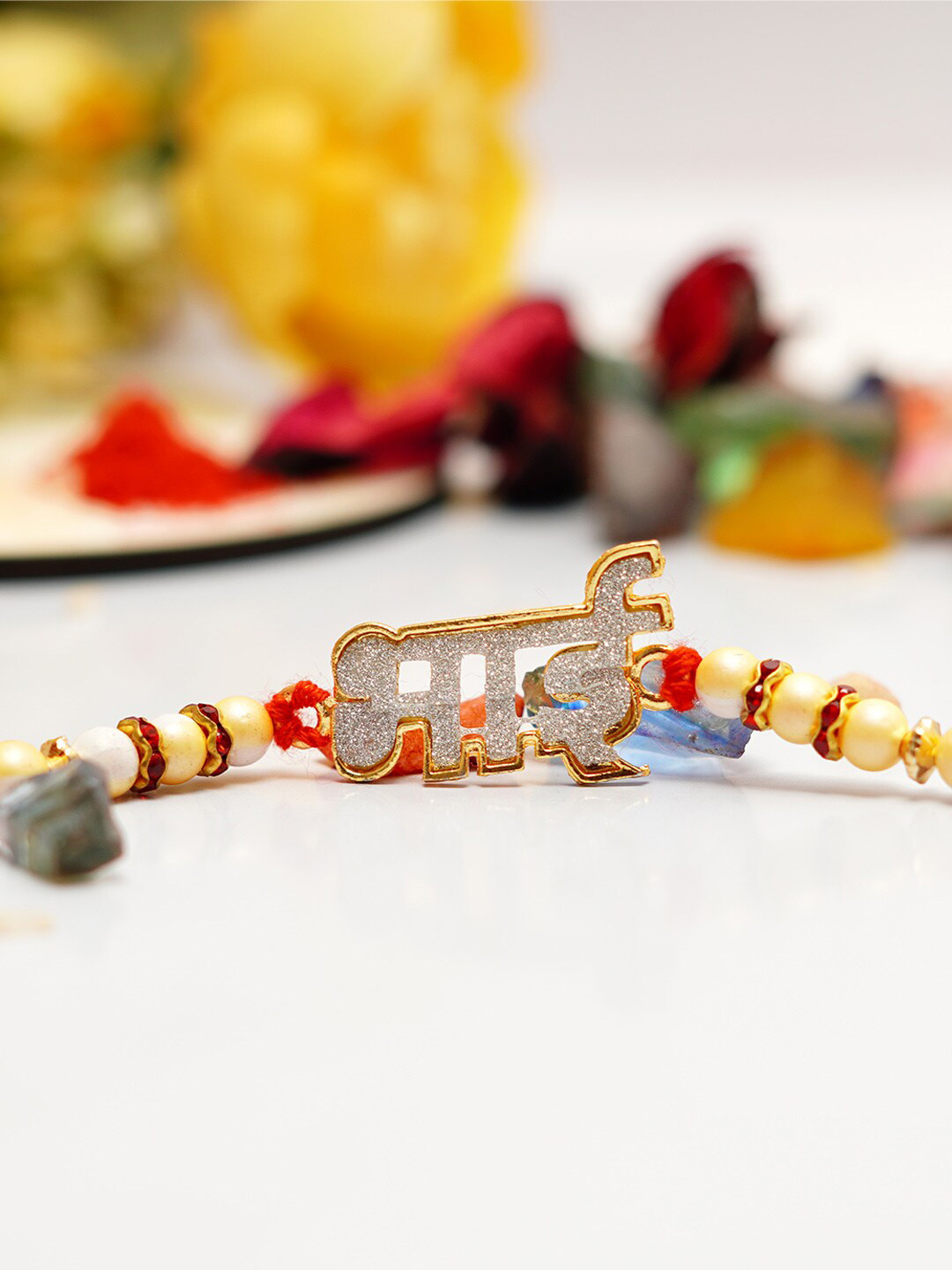 

Urmika Stone-Studded & Hindi Bro Charm Rakhi, Red