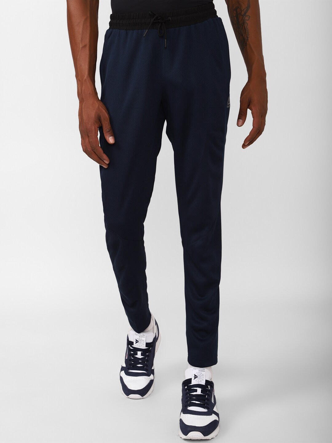 

Reebok Men Fitness WOR SL TRCKSTR Track Pants, Navy blue