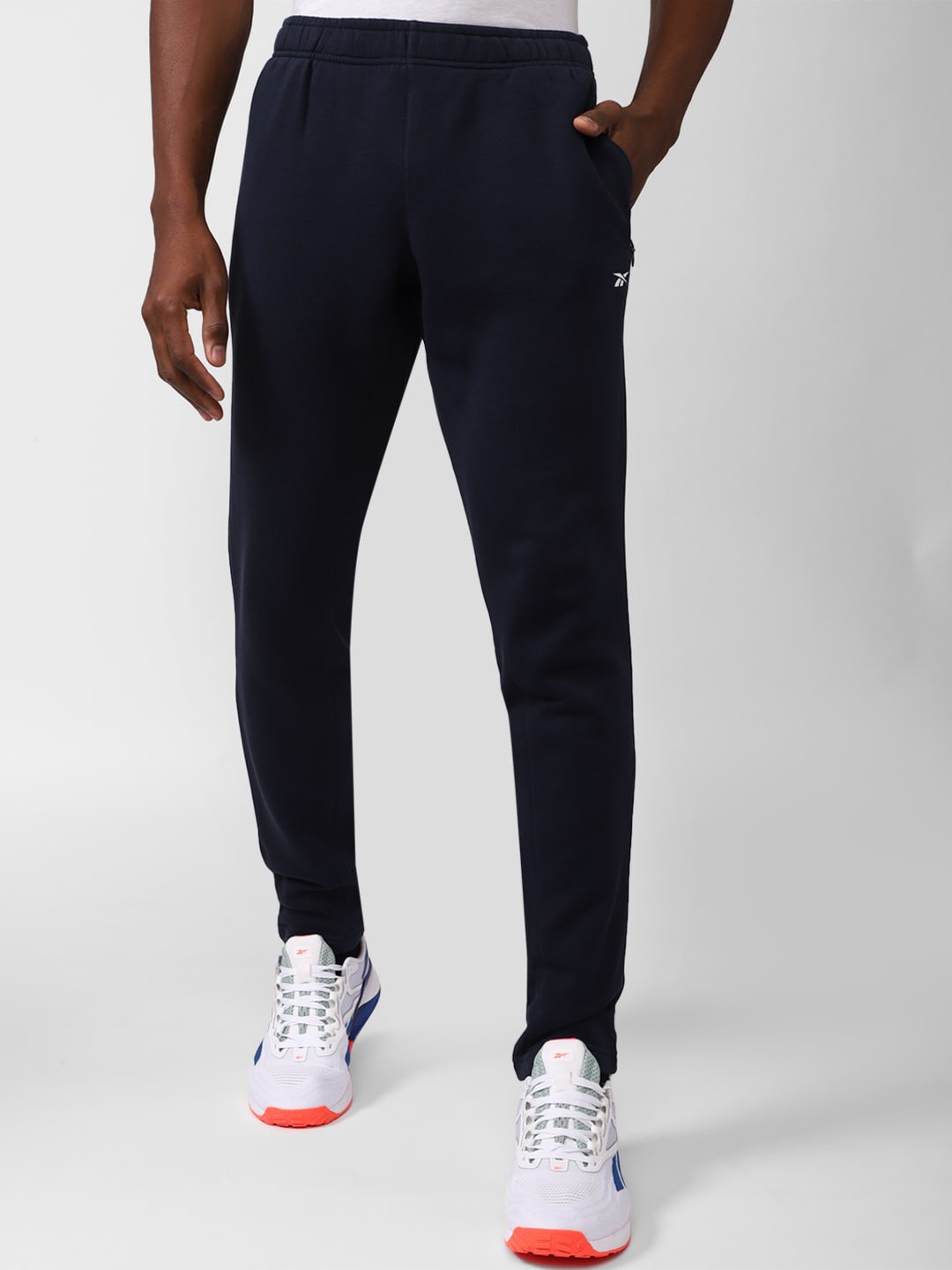 

Reebok Men TE Linear Logo FT Track Pants, Navy blue