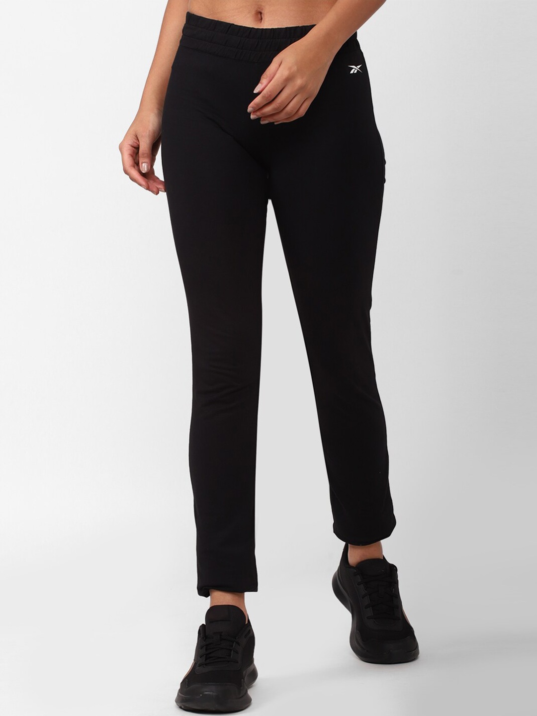 

Reebok Women Slim-Fit Mid-Rise Track Pants, Black