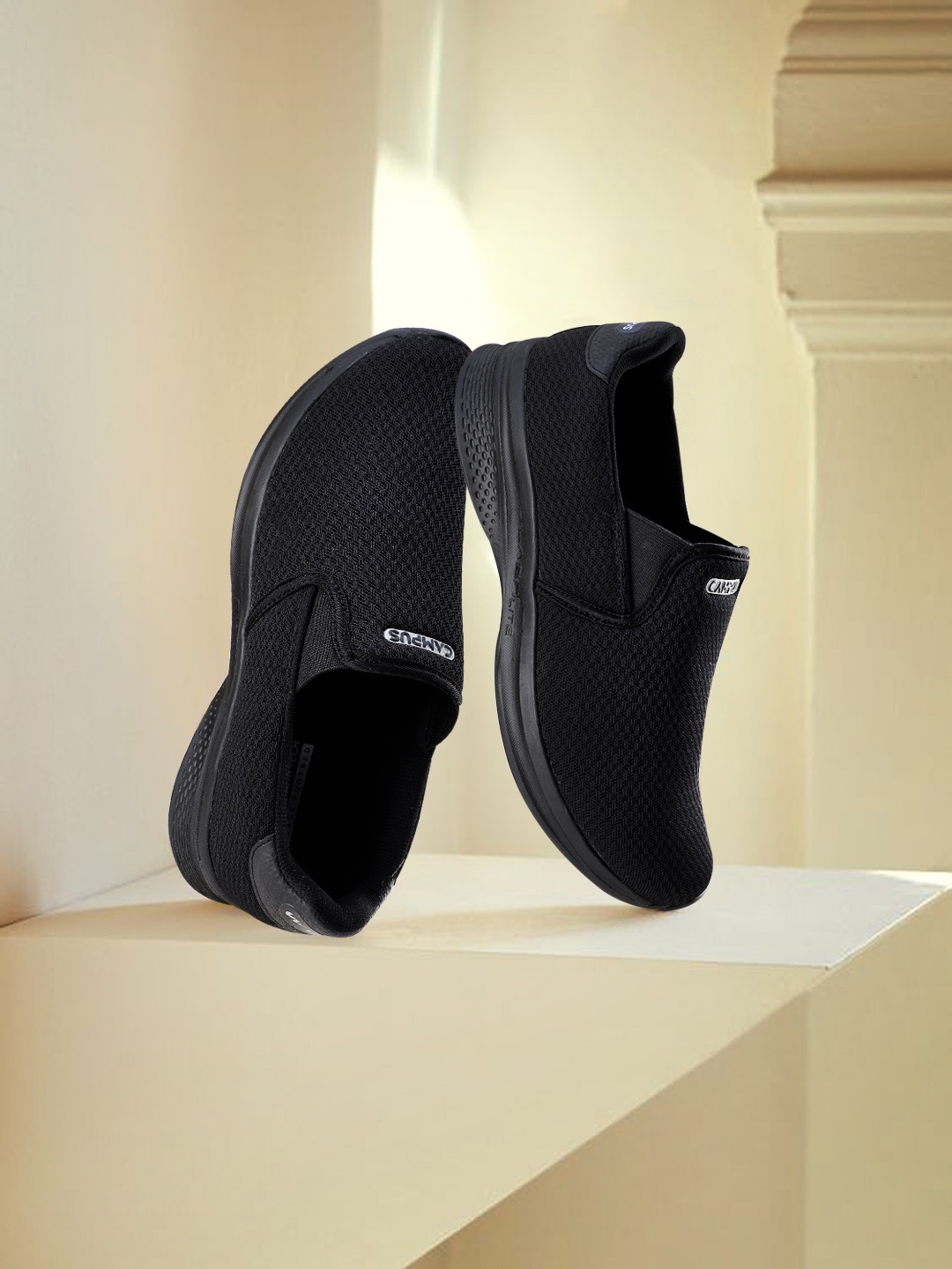 

Campus Men Mesh Walking Non-Marking Slip-On Shoes, Black