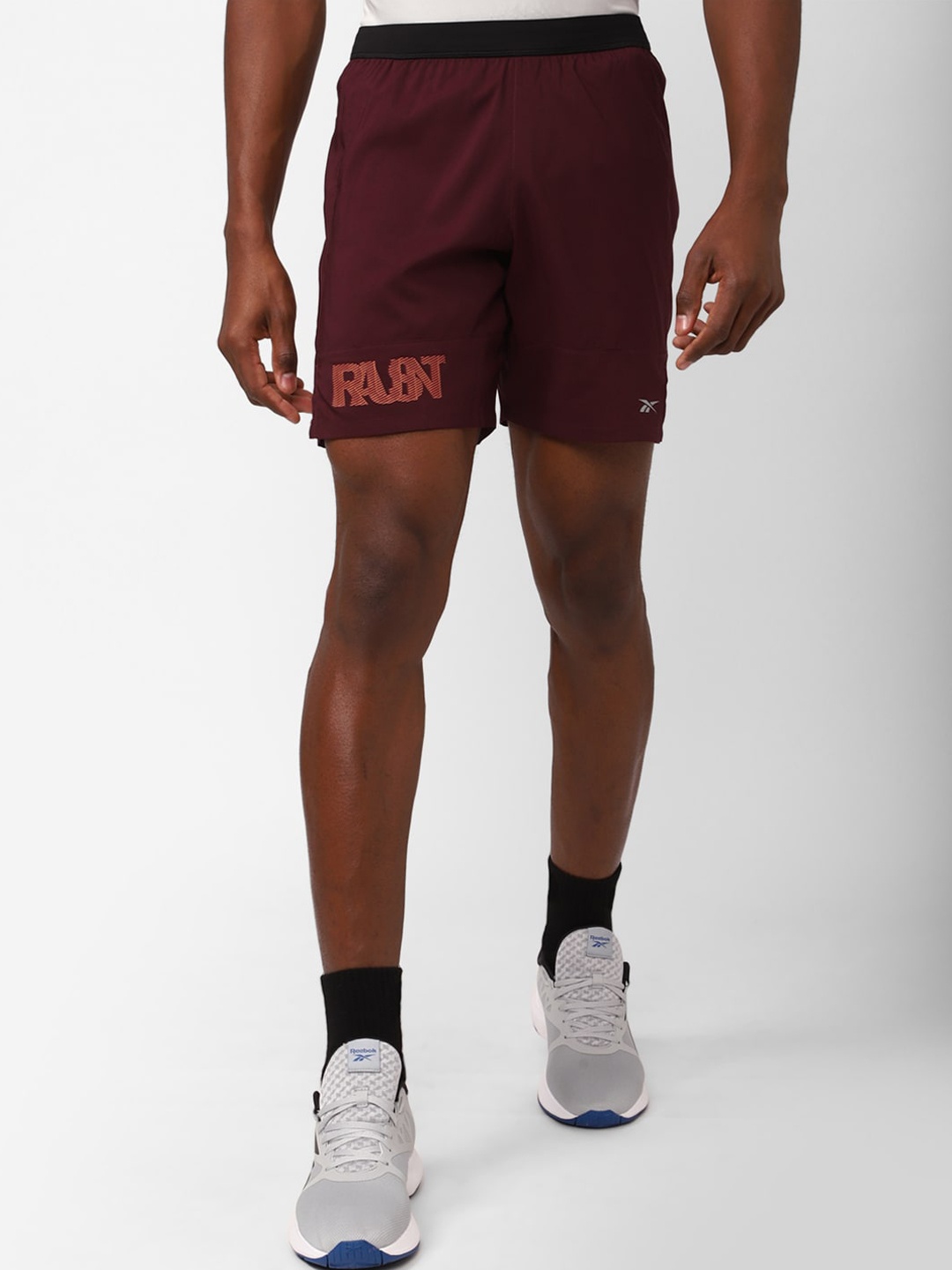 

Reebok Men Mid-Rise Knee-Length Sports Shorts, Maroon