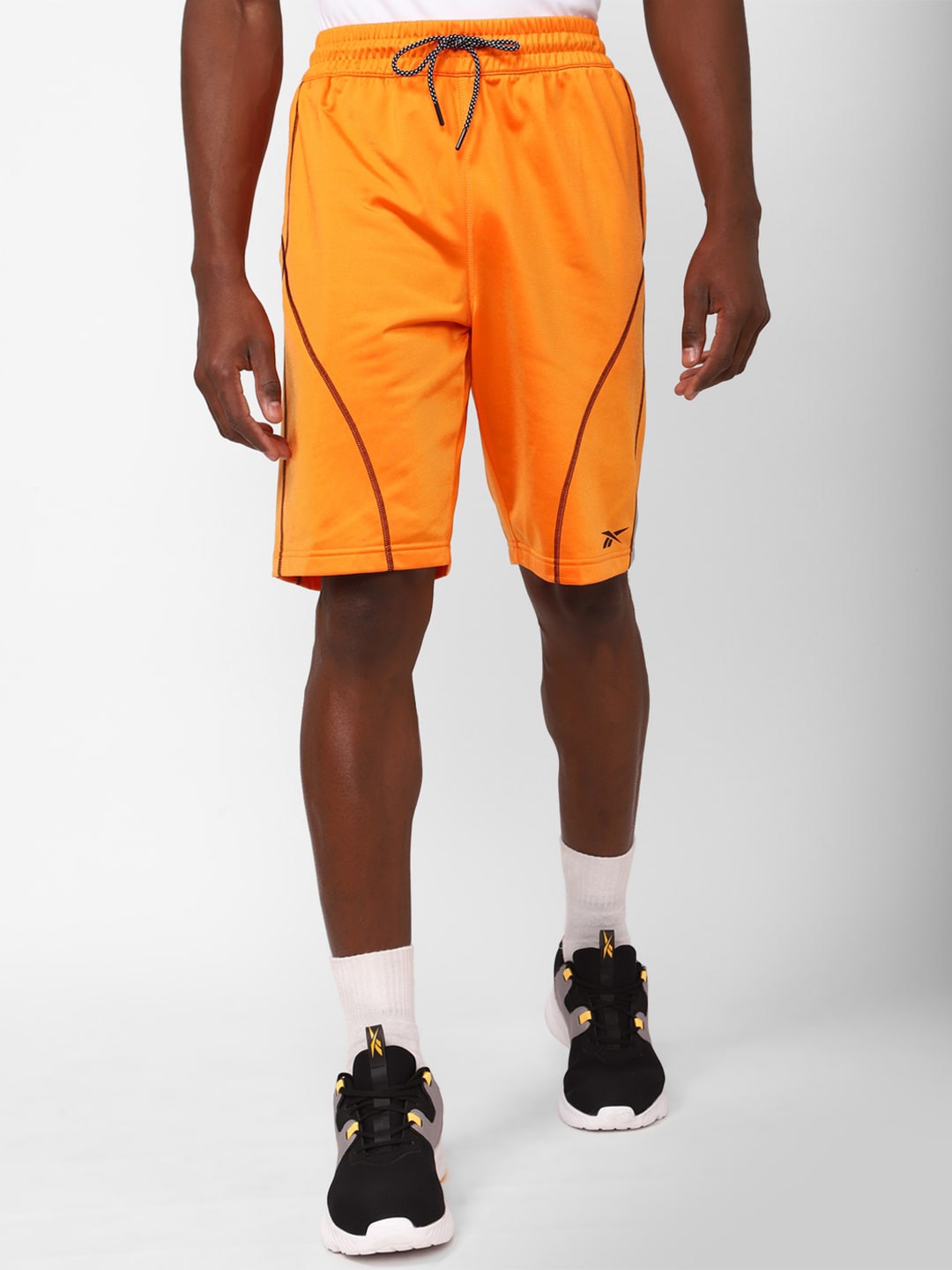 

Reebok Men Slim-Fit Knee-Length Shorts, Orange