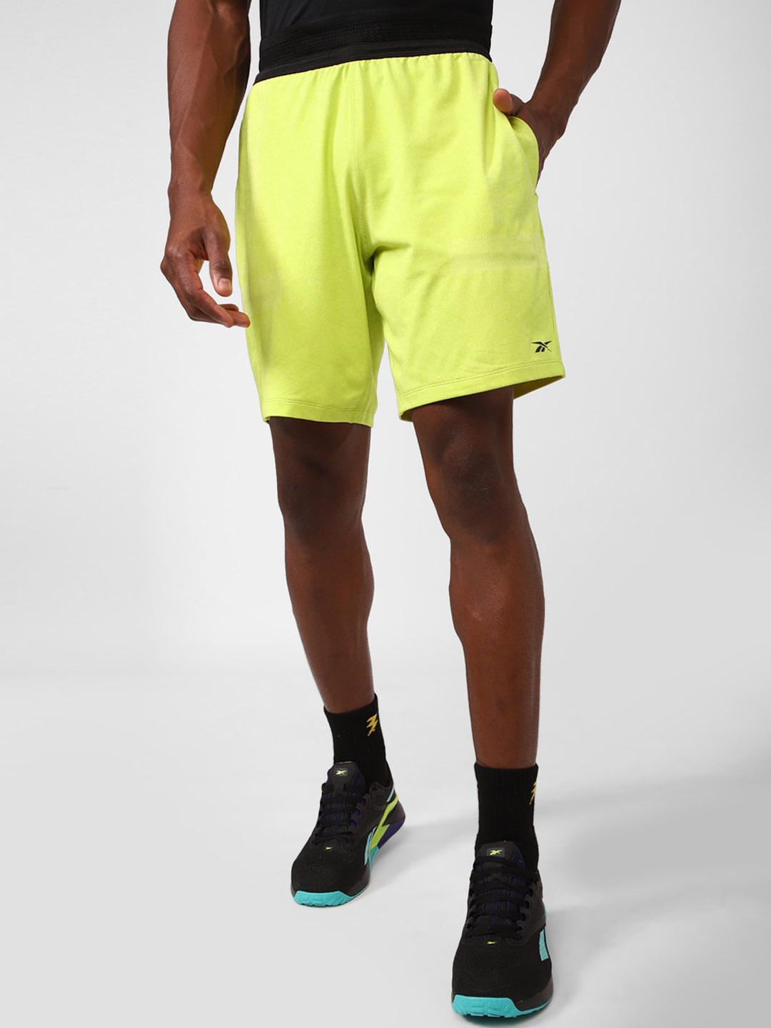 

Reebok Men UBF Myoknit Sports Shorts, Yellow