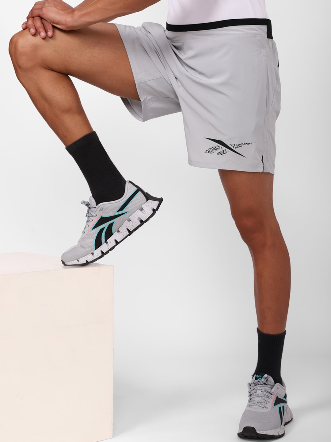 

Reebok Men Brand Logo Printed Detail Shorts, Grey
