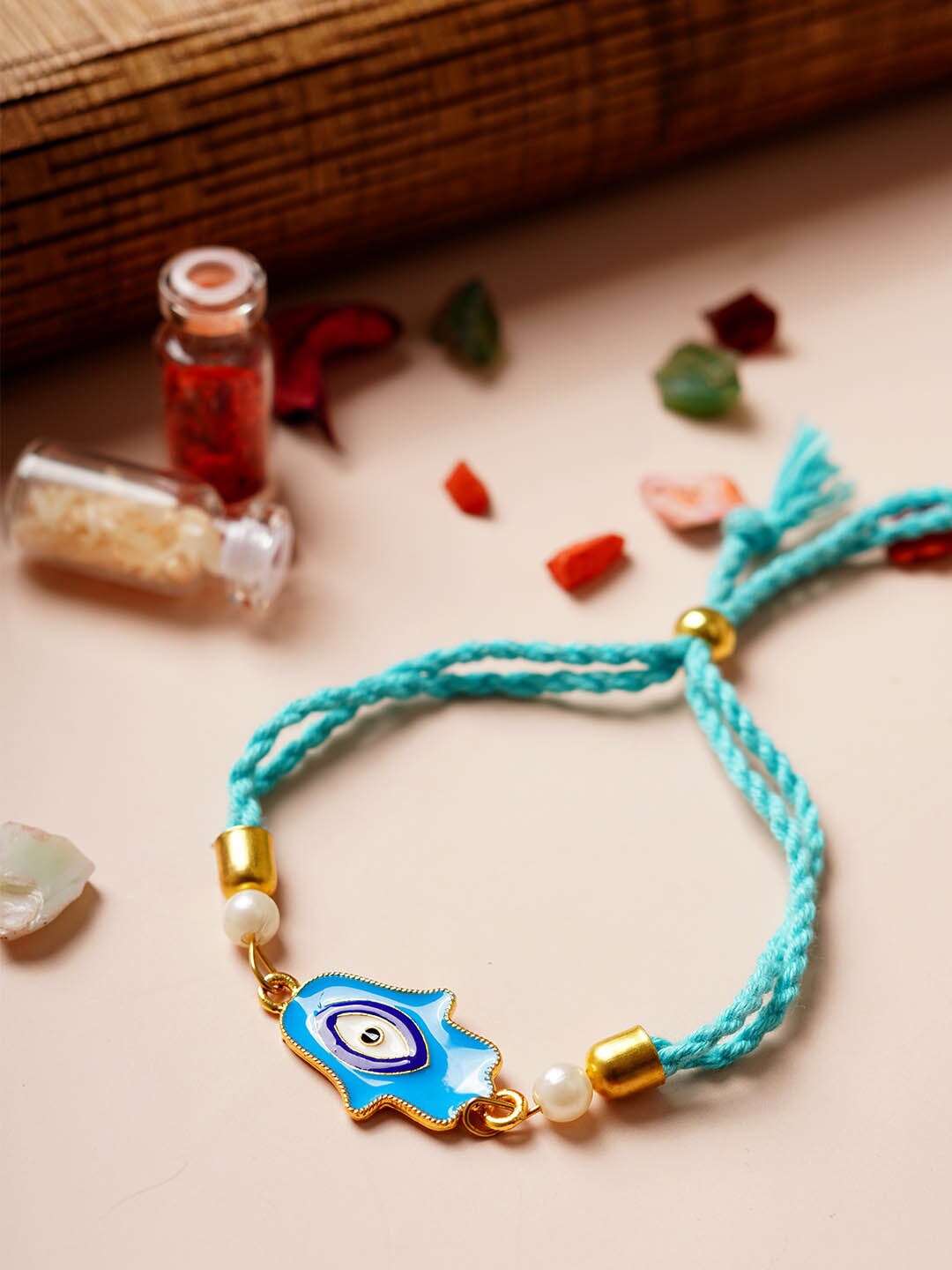 

Ferosh Hamsa Hand Thread Rakhi, Blue
