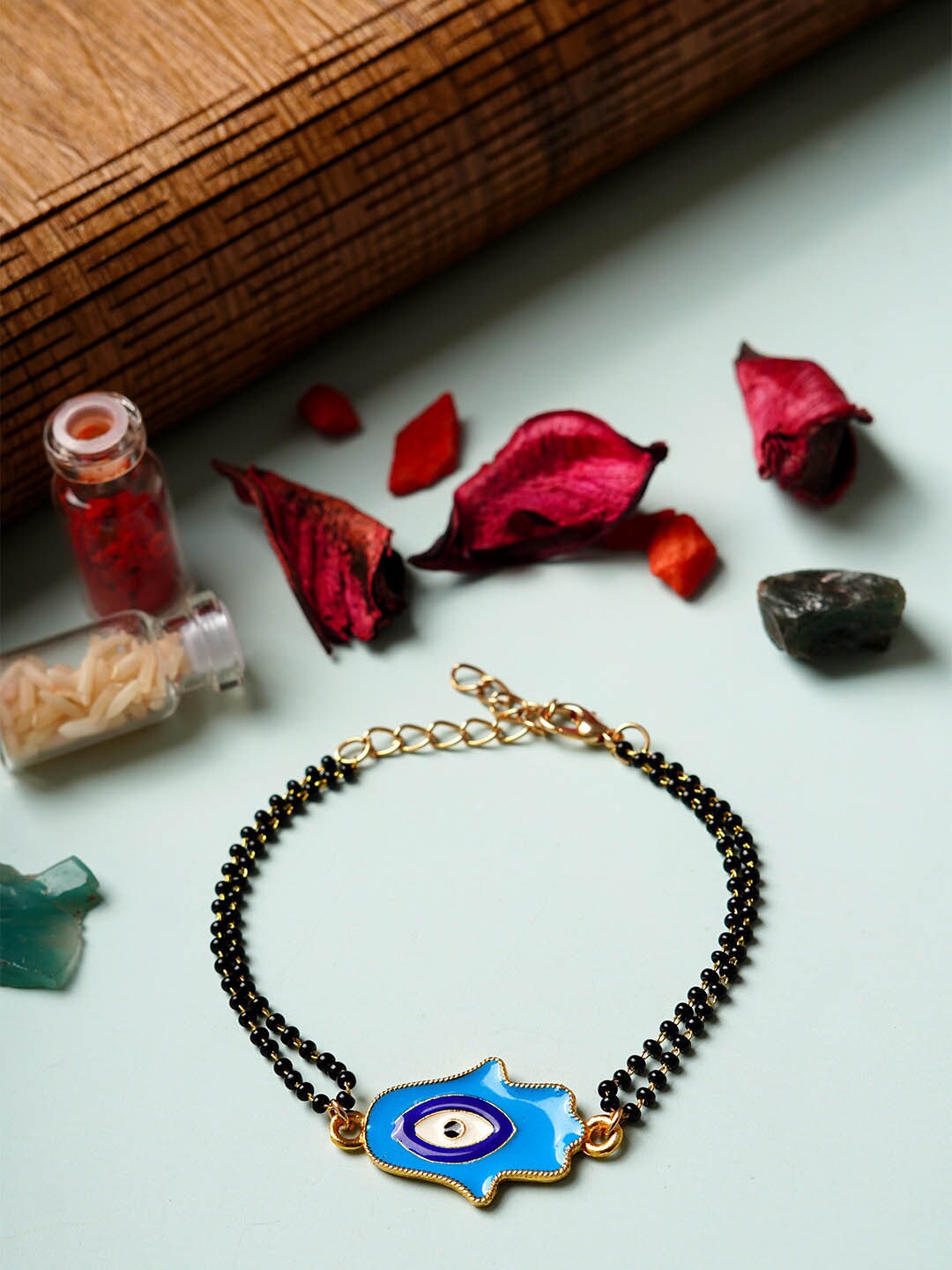 

Ferosh Hamsa Hand Mangalsutra Beaded Rakhi, Black