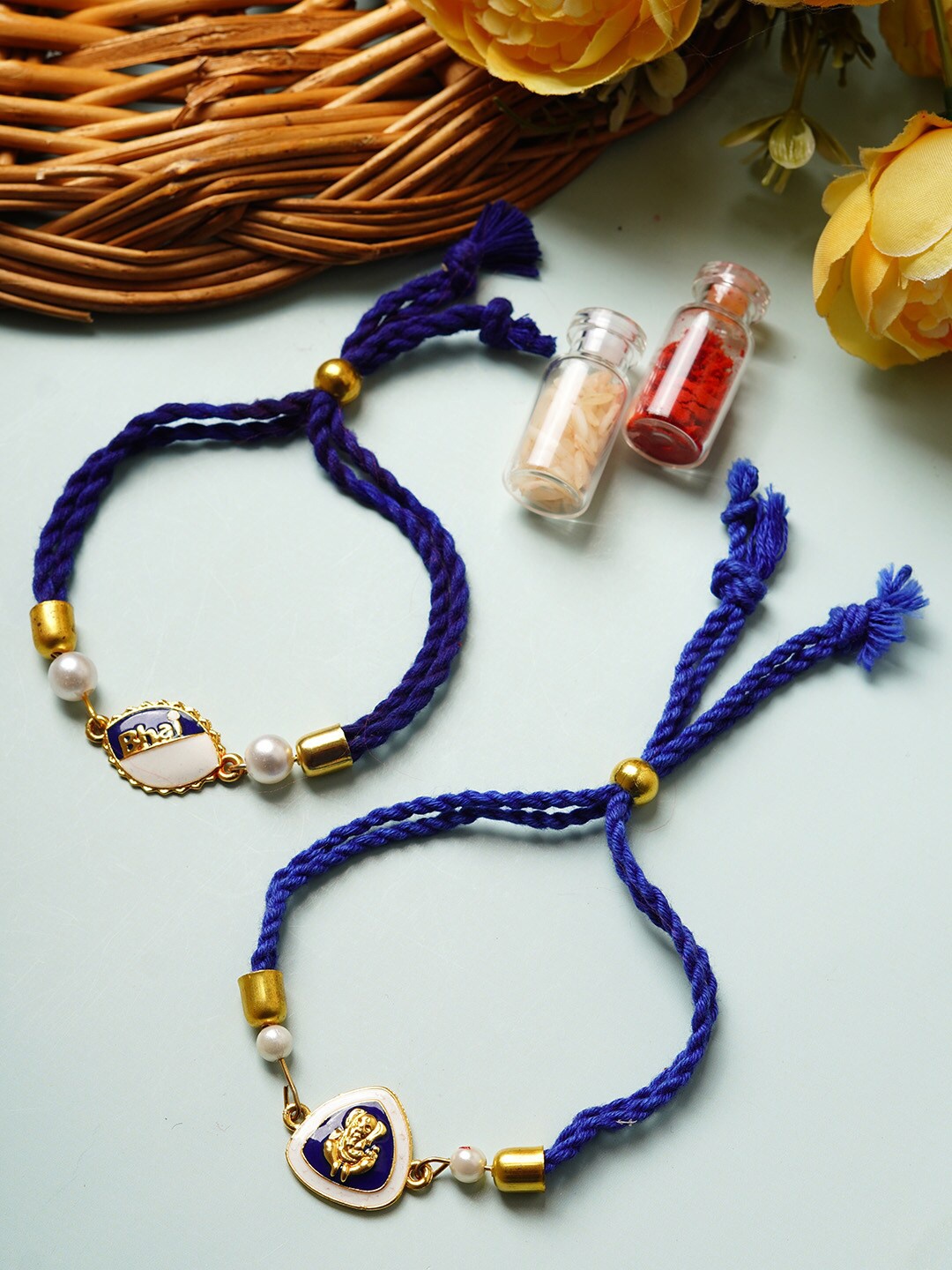 

Ferosh Set Of 2 Shri Ganesh Stone Thread Rakhi, Blue