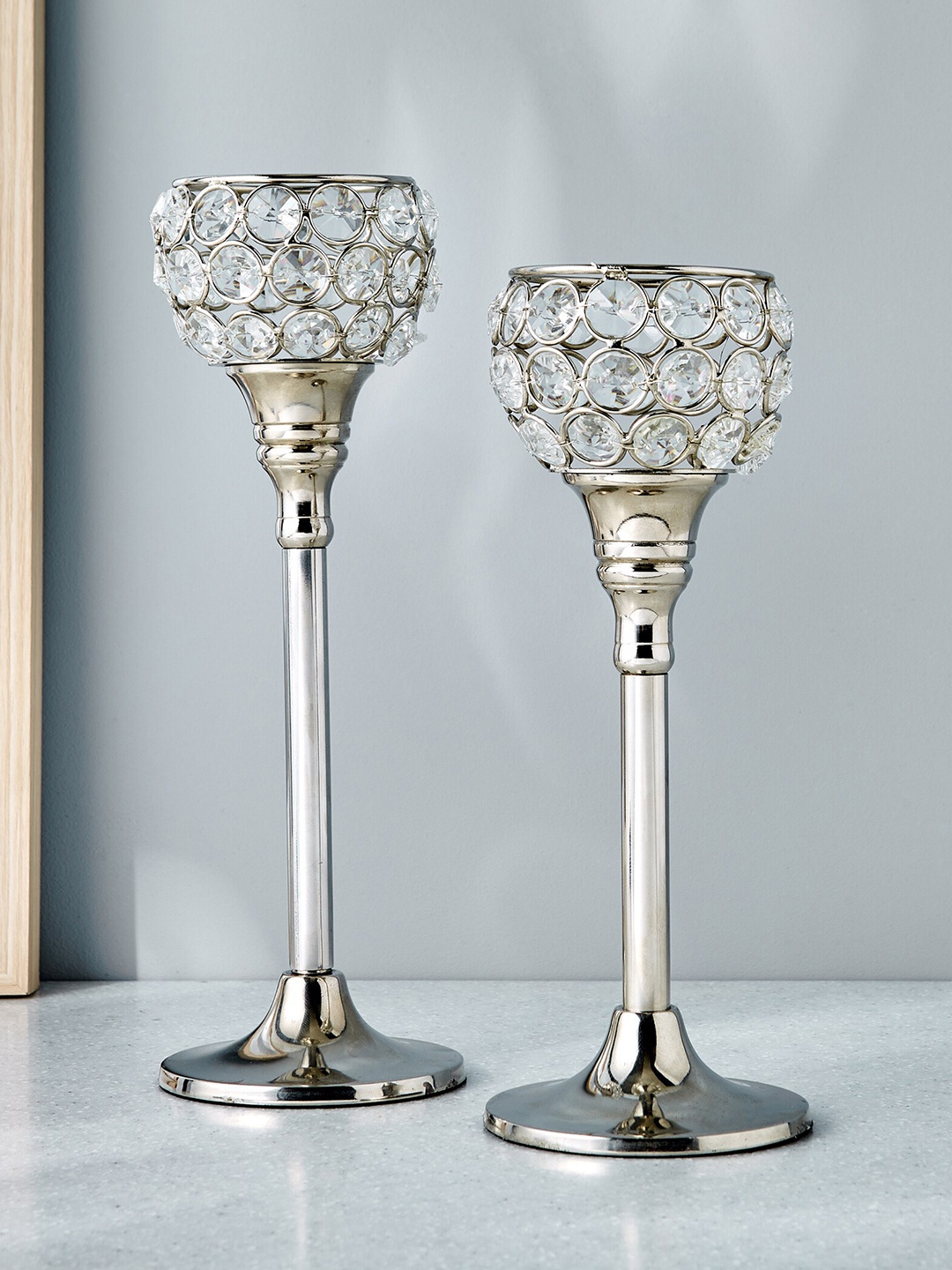 

Home Centre Silver Toned 2 Pieces Textured Iron & Crystal Pedestal Candle Holders