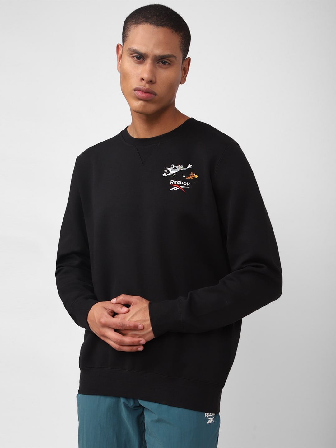 

Reebok Men Tom And Jerry Printed Classic Pullover Sweatshirt, Black