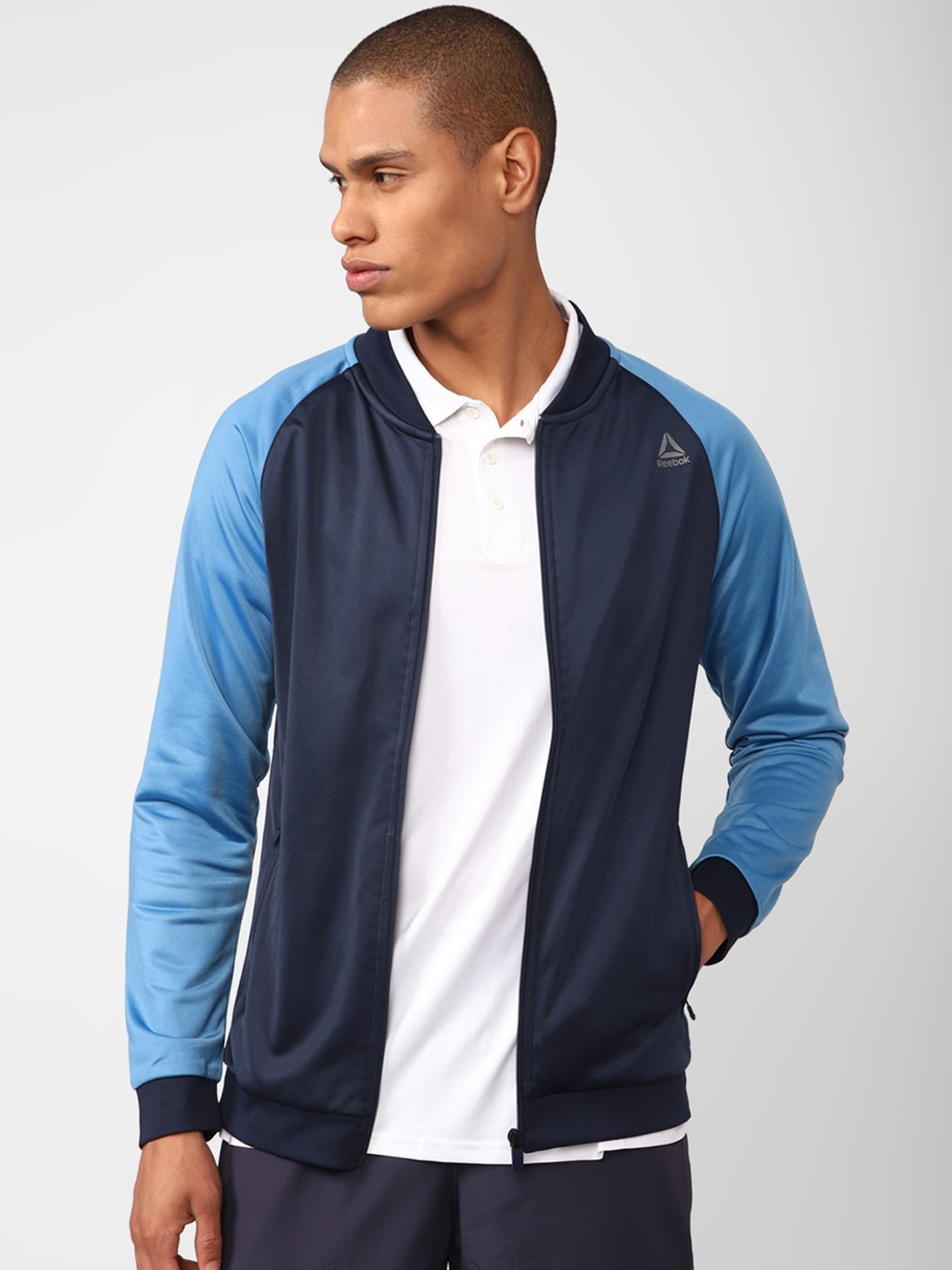 

Reebok Men Logo Printed Hustle Sporty Jacket, Navy blue