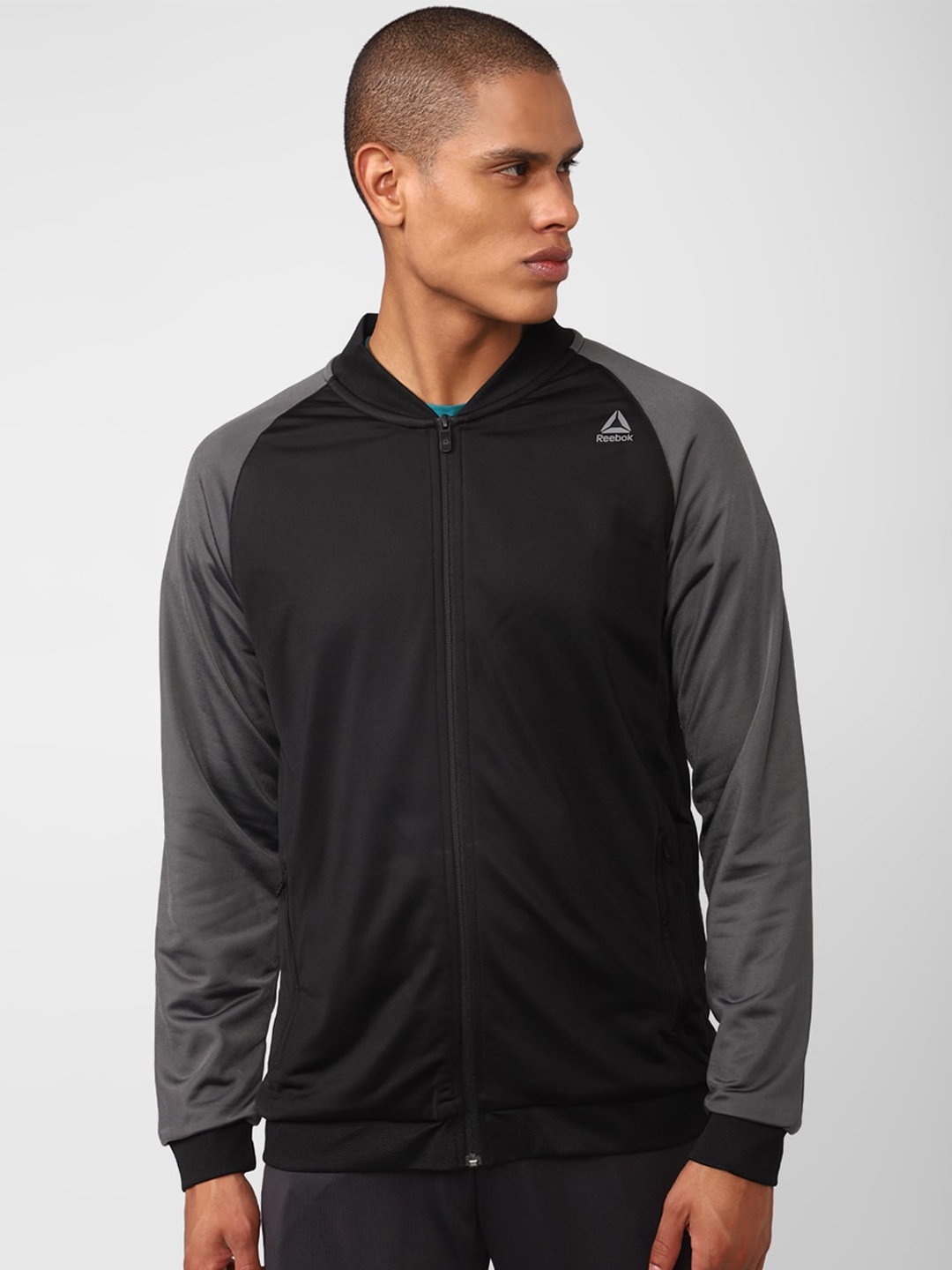 

Reebok Men Logo Printed Hustle Sporty Jacket, Black